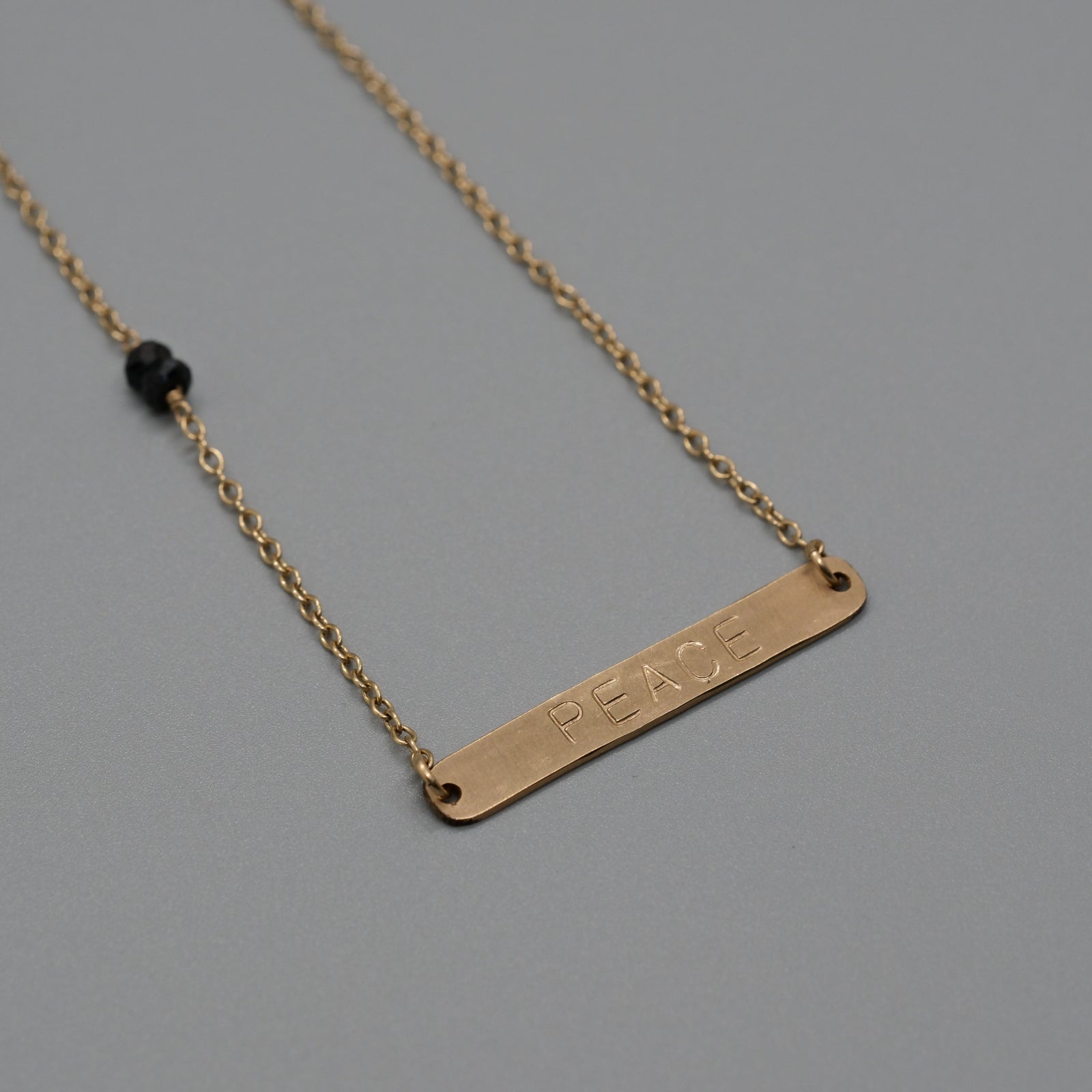 Peace with black onyx necklace