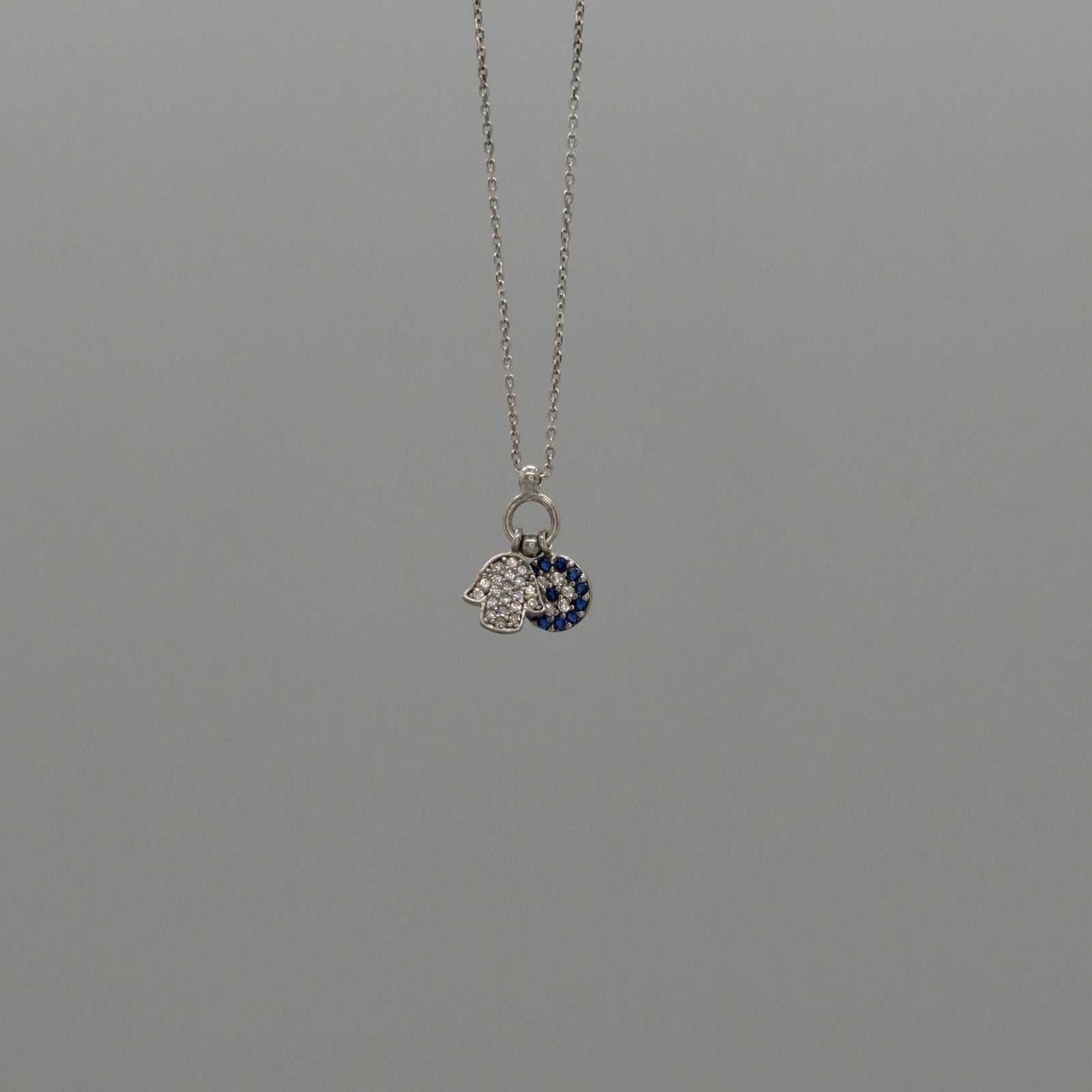Hamsa and eye necklace
