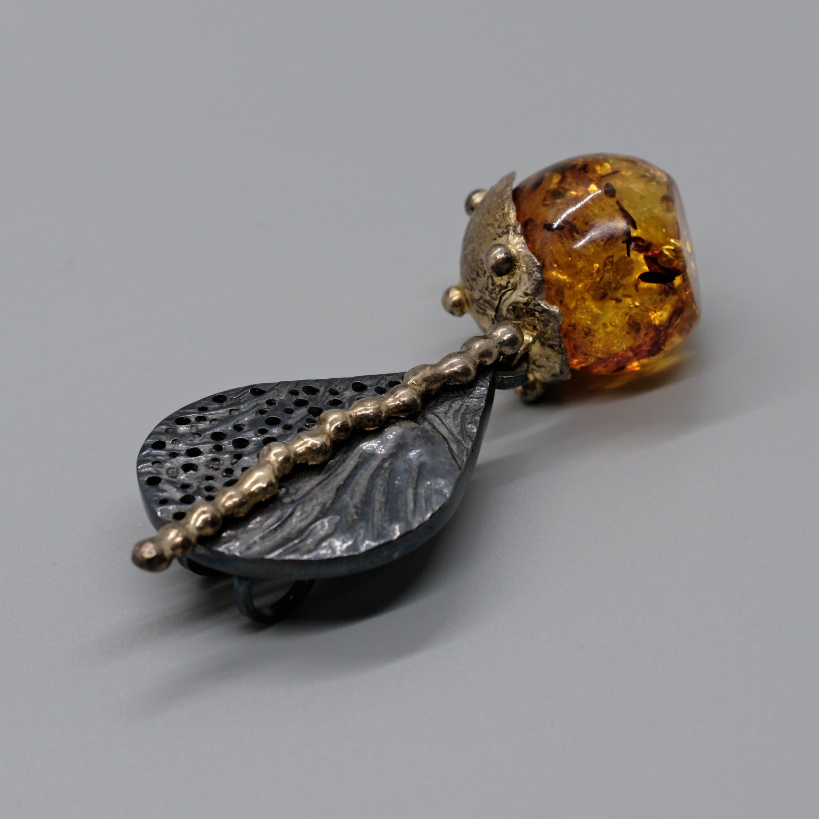 Artisan Amber Orb & Leaf Long Pendant