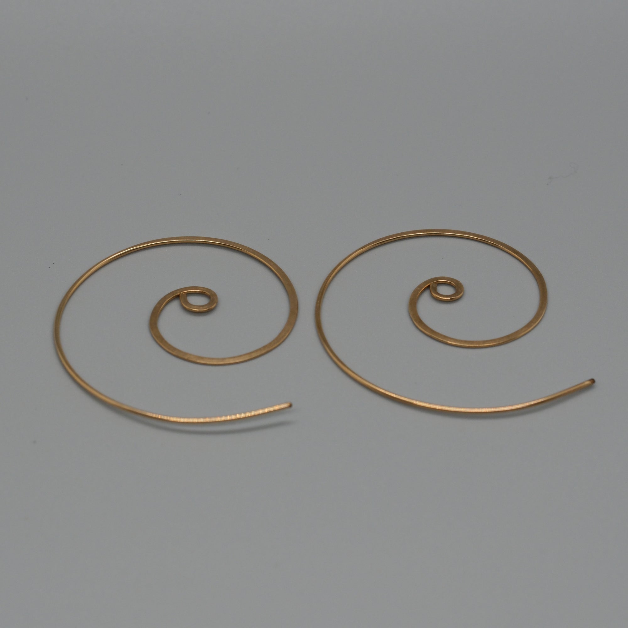 Large swirl earrings
