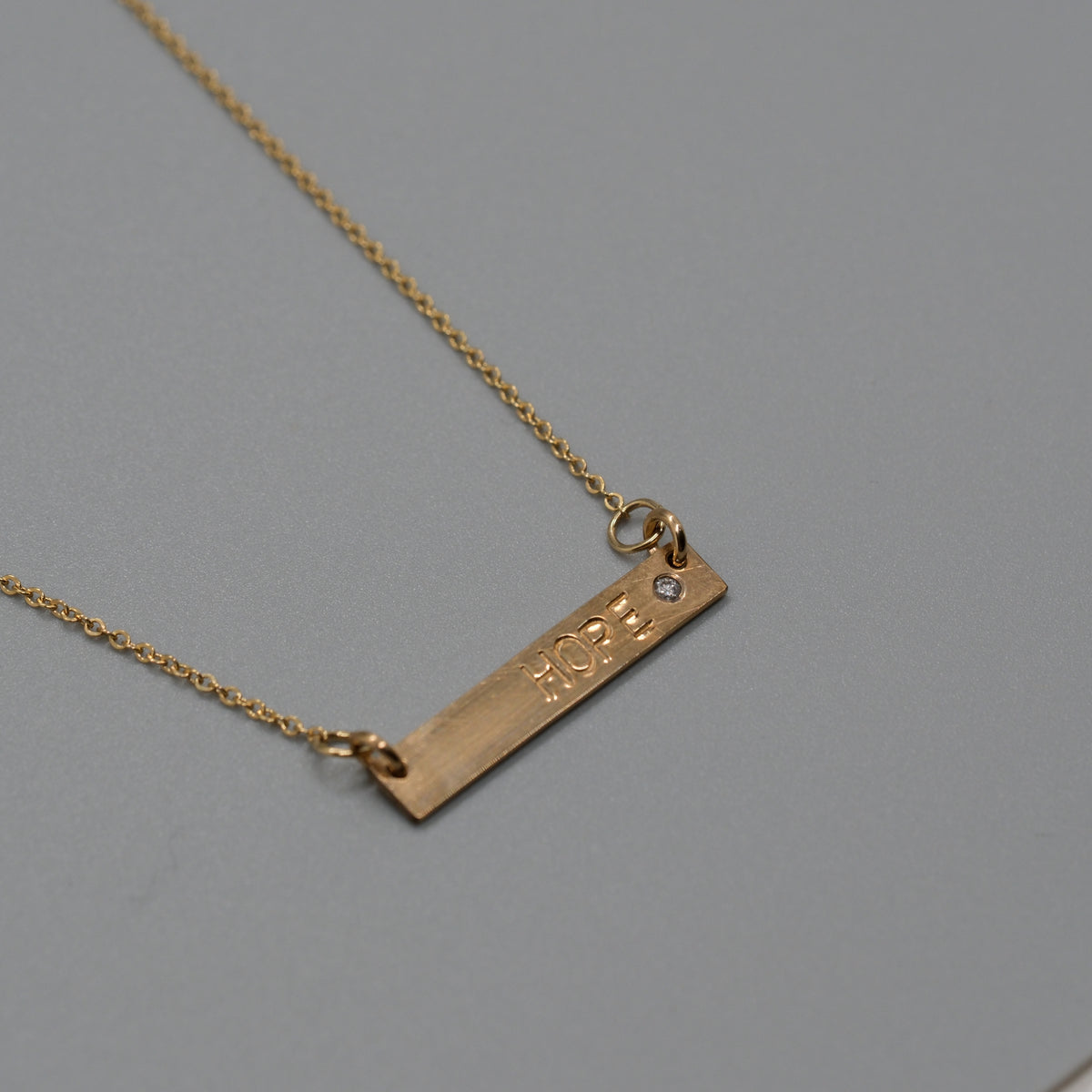 Hope with a diamond necklace