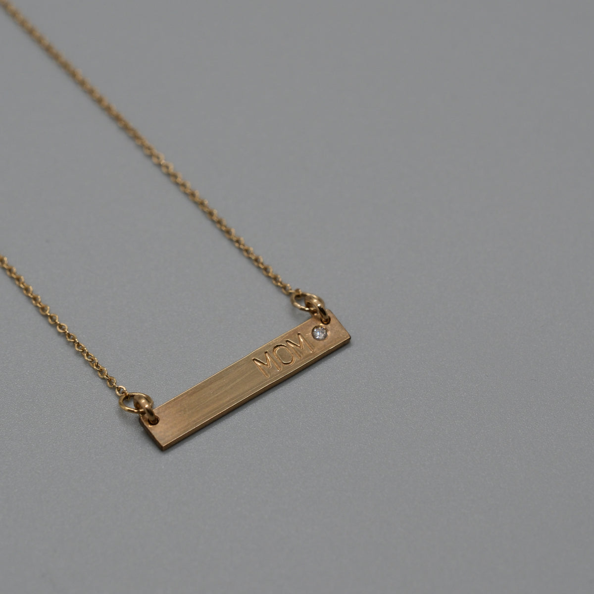 mom with a diamond necklace
