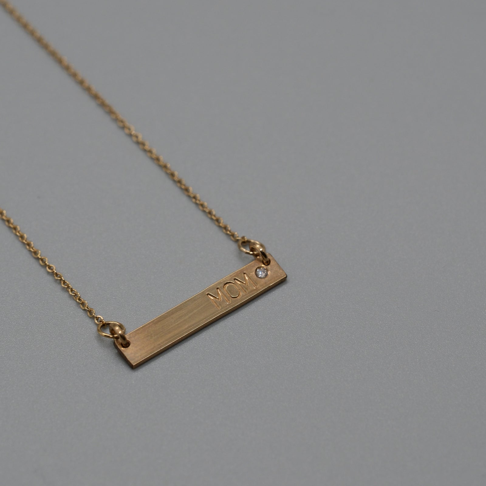 mom with a diamond necklace