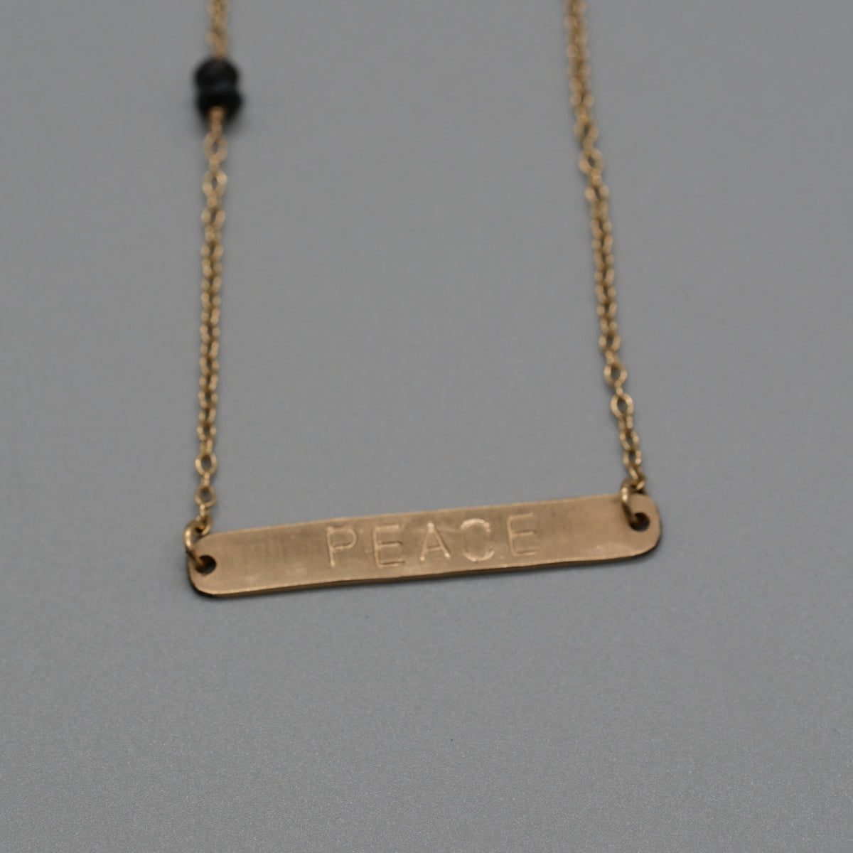 Peace with black onyx necklace