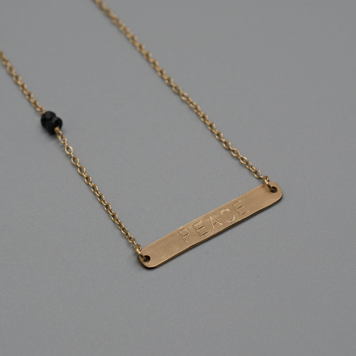 Peace with black onyx necklace