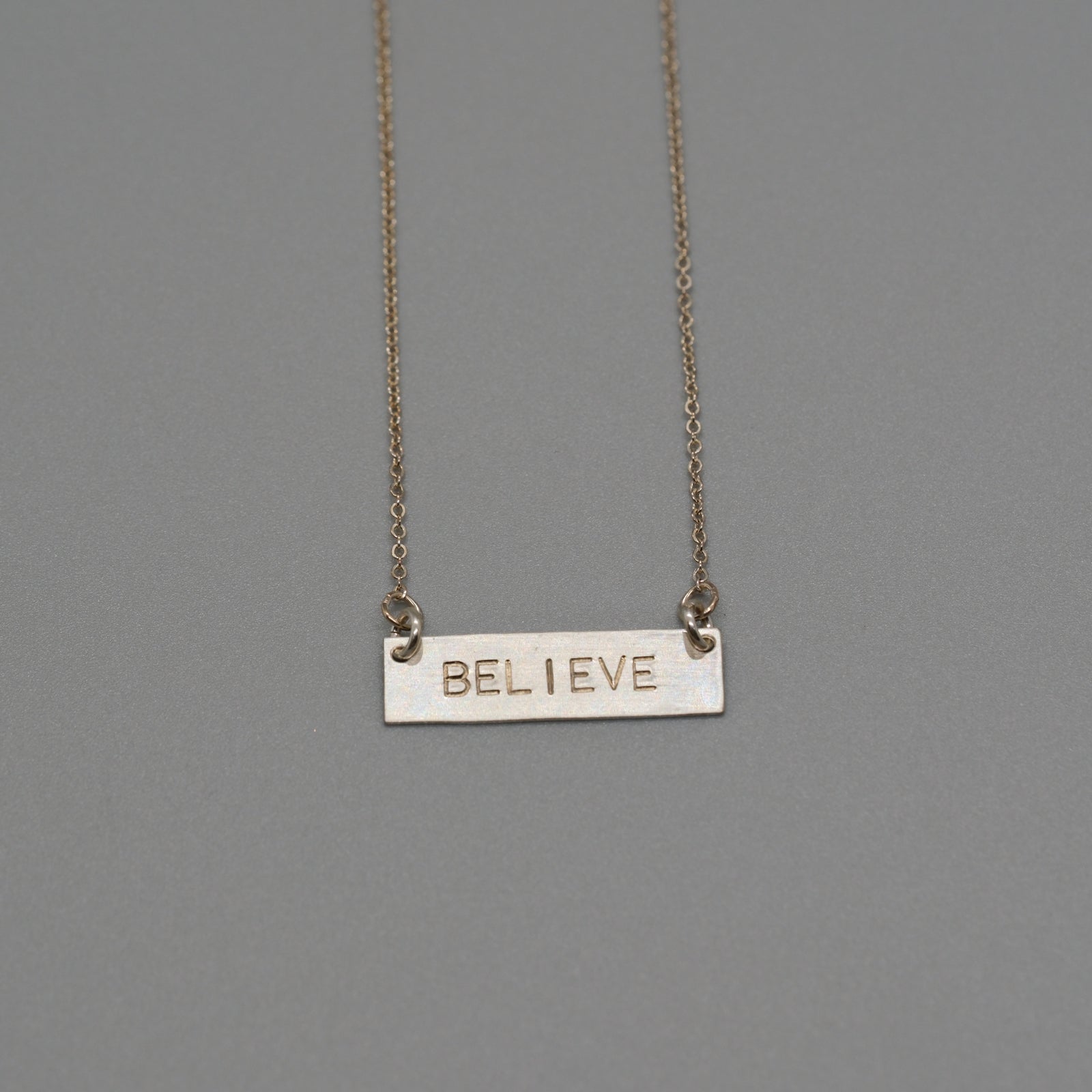 believe bar necklace