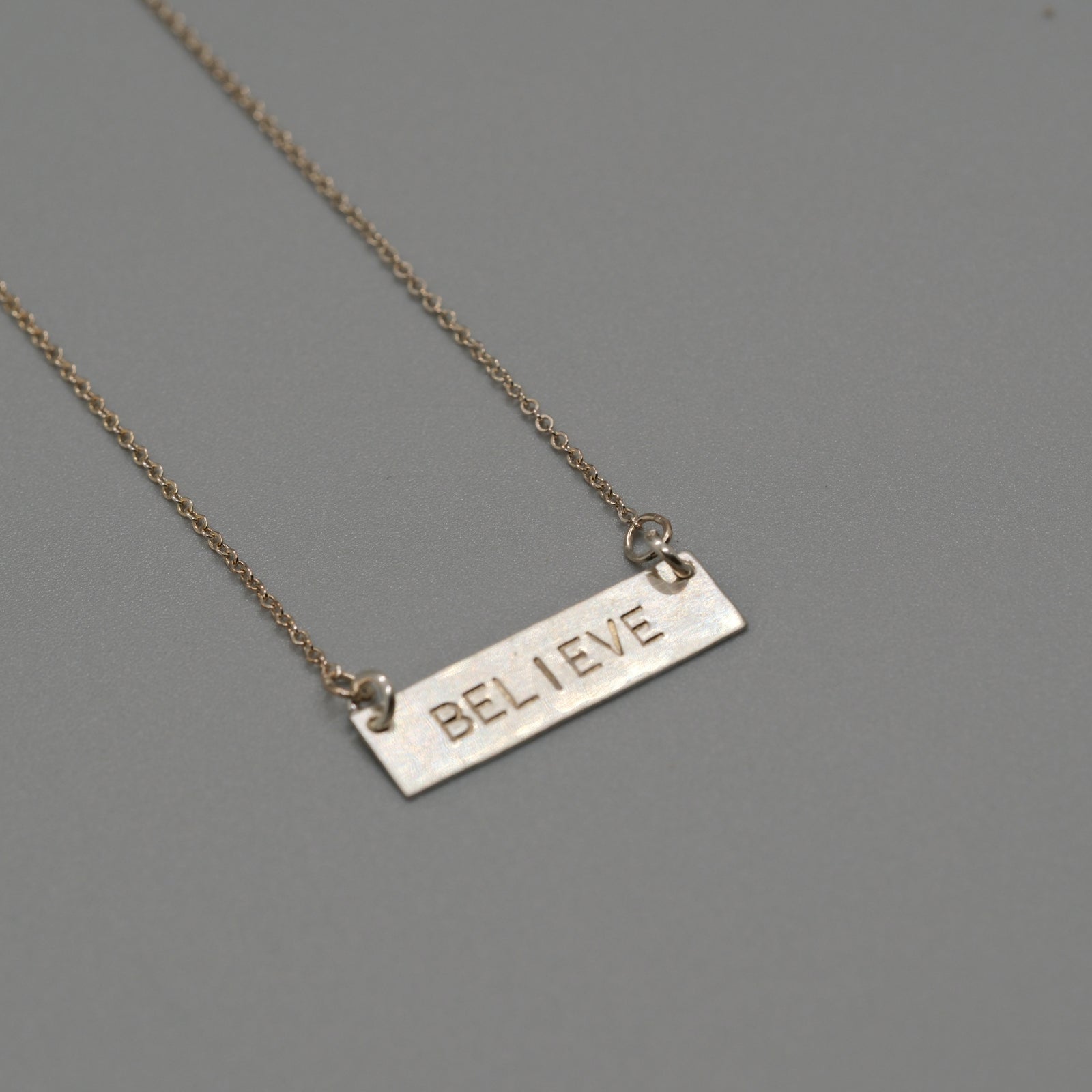 believe bar necklace
