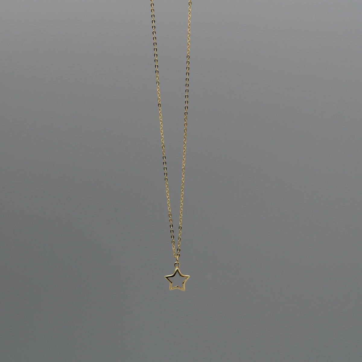 Cut out star necklace