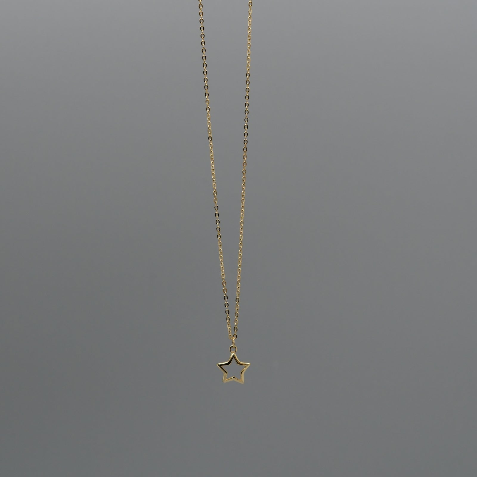 Cut out star necklace