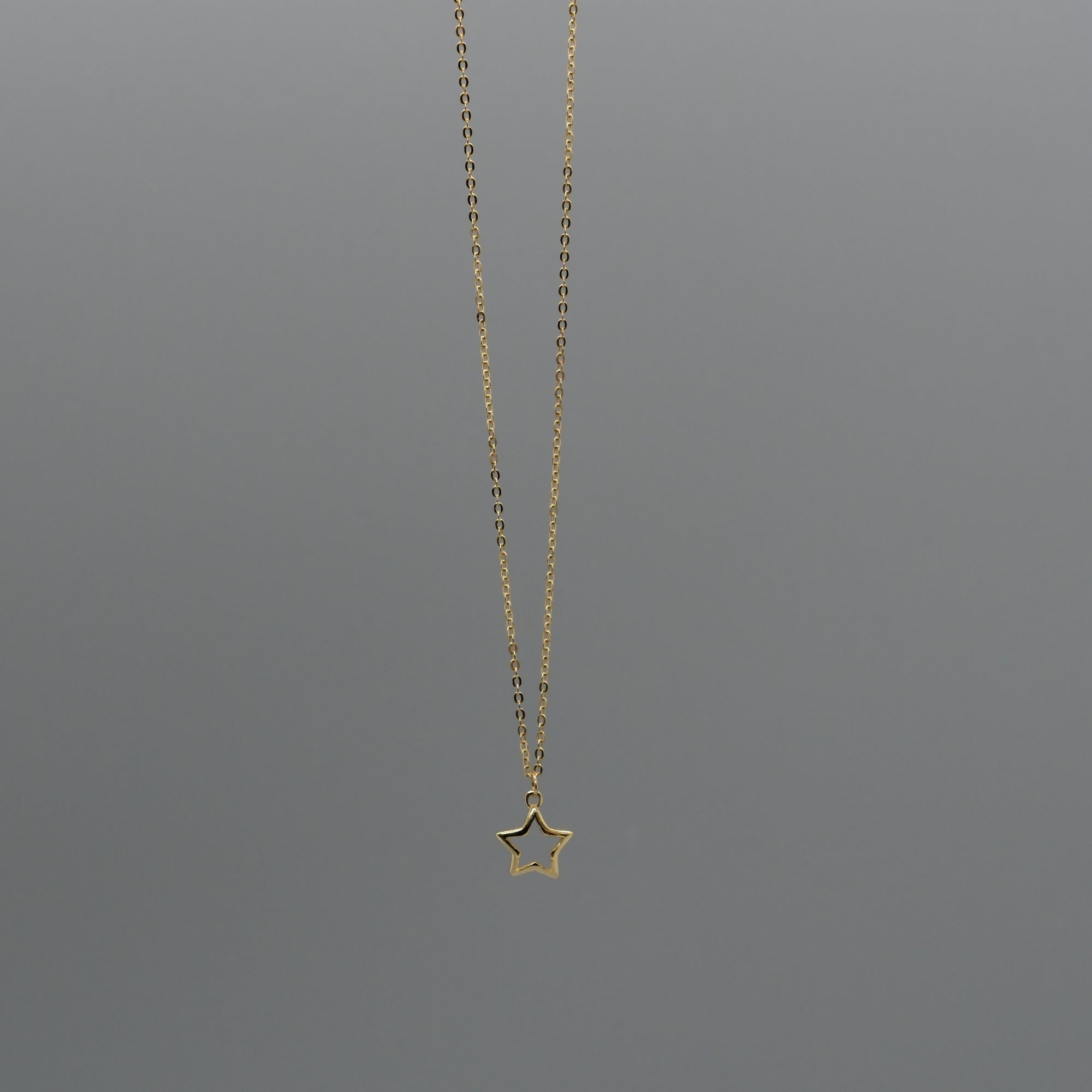 Cut out star necklace