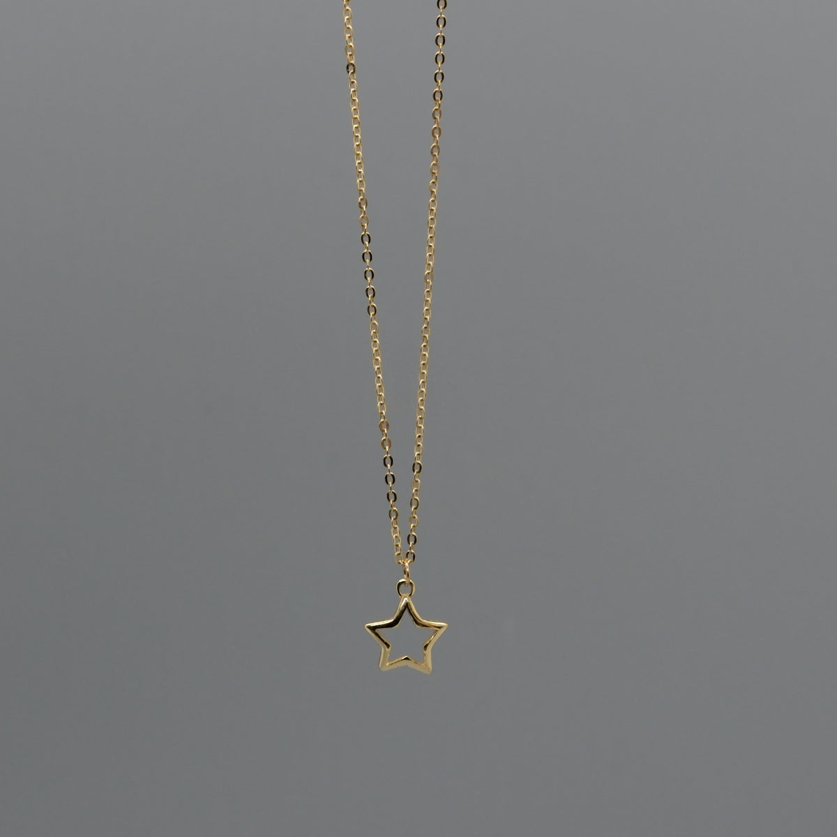 Cut out star necklace