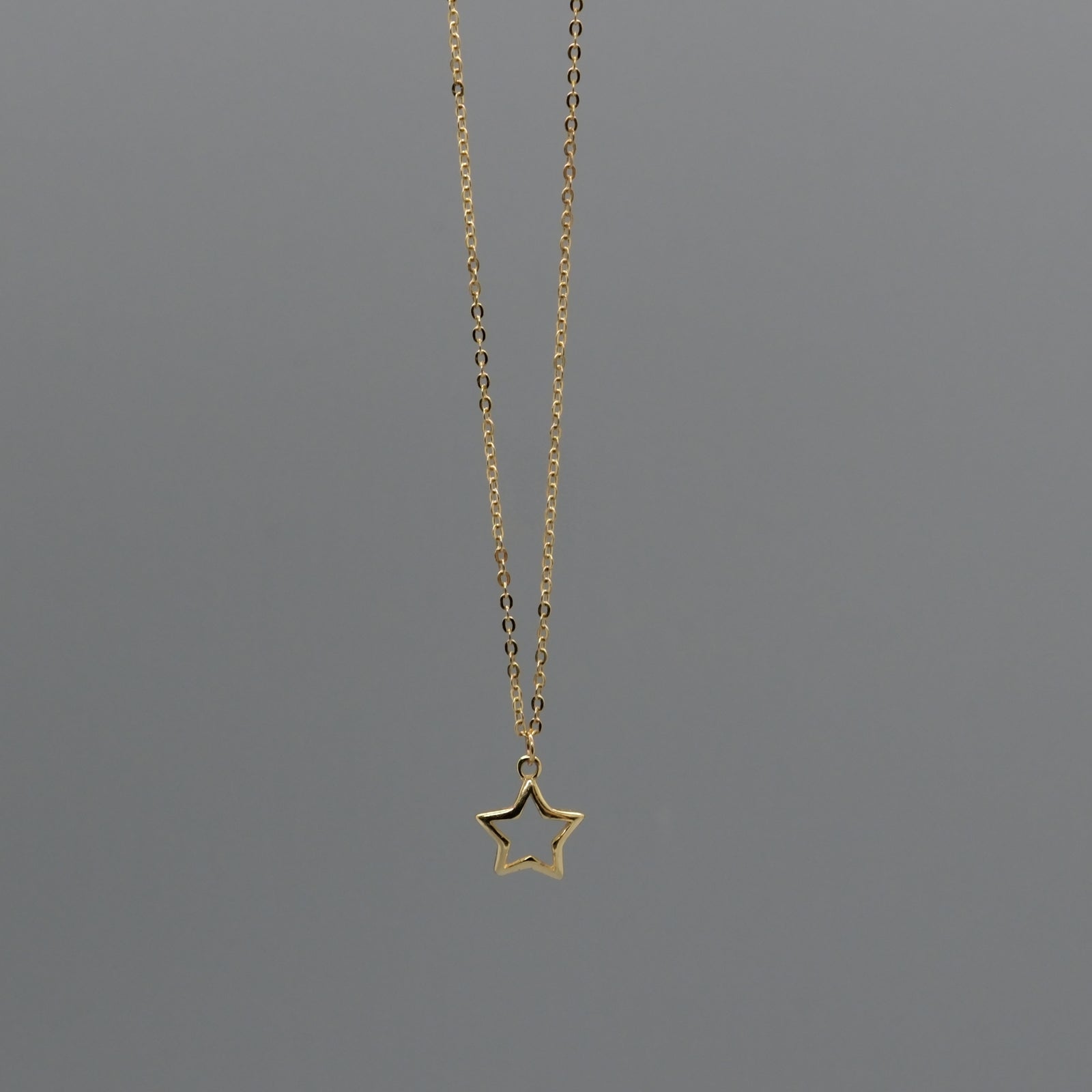 Cut out star necklace