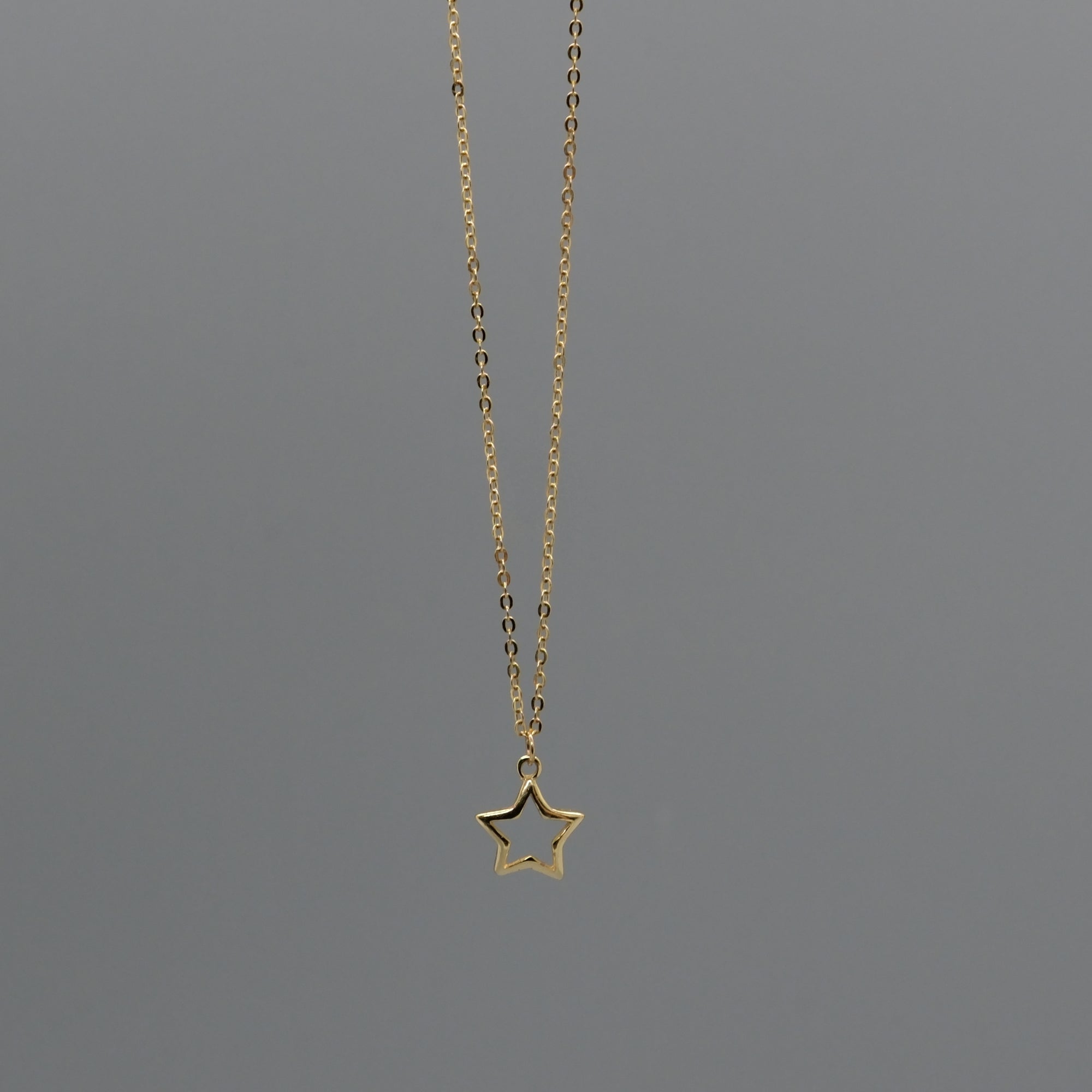 Cut out star necklace