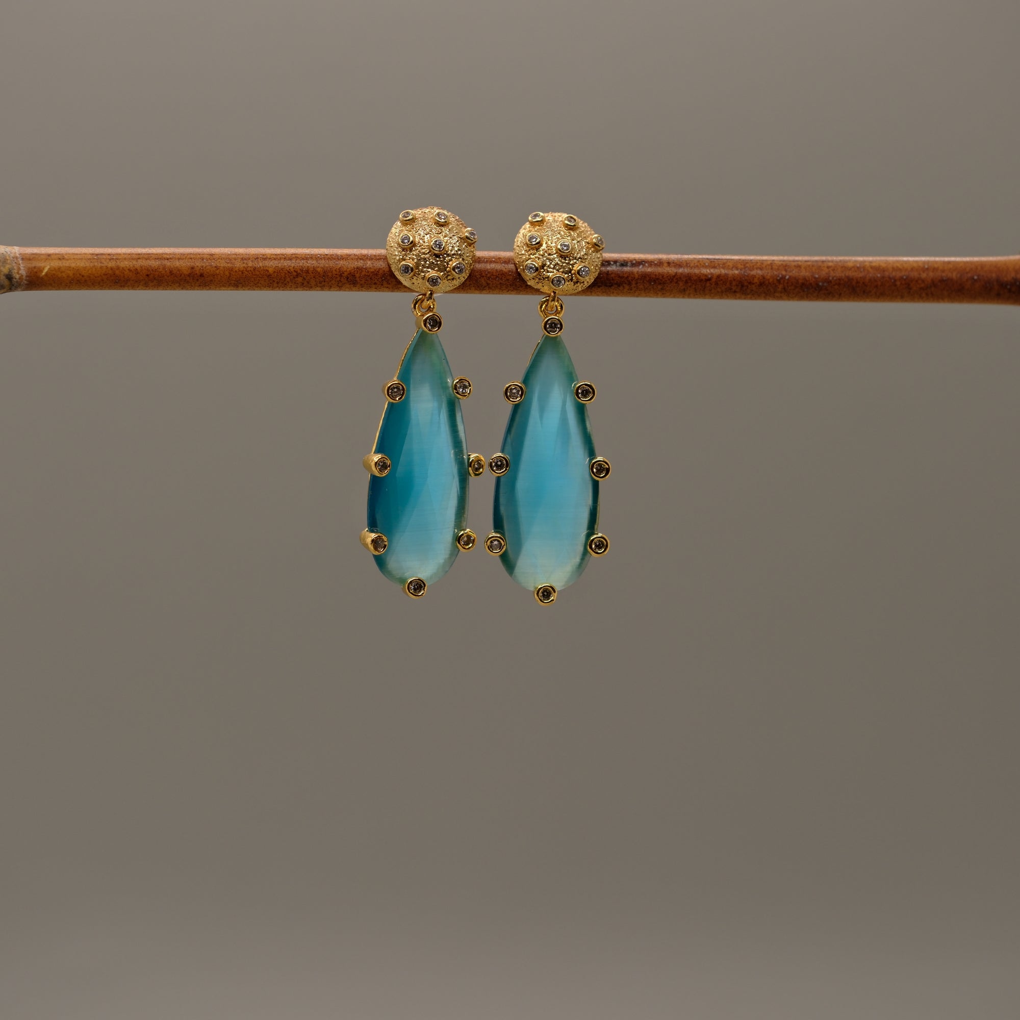 Brass post drop earrings with cat’s eye