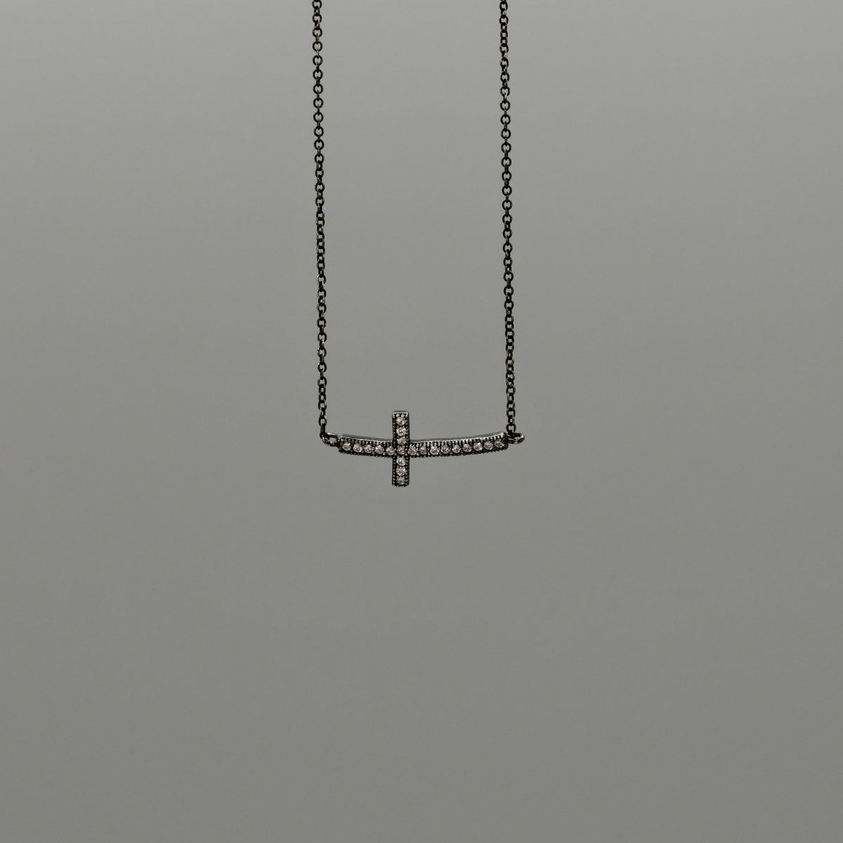 Sideways Spark Cross Necklace