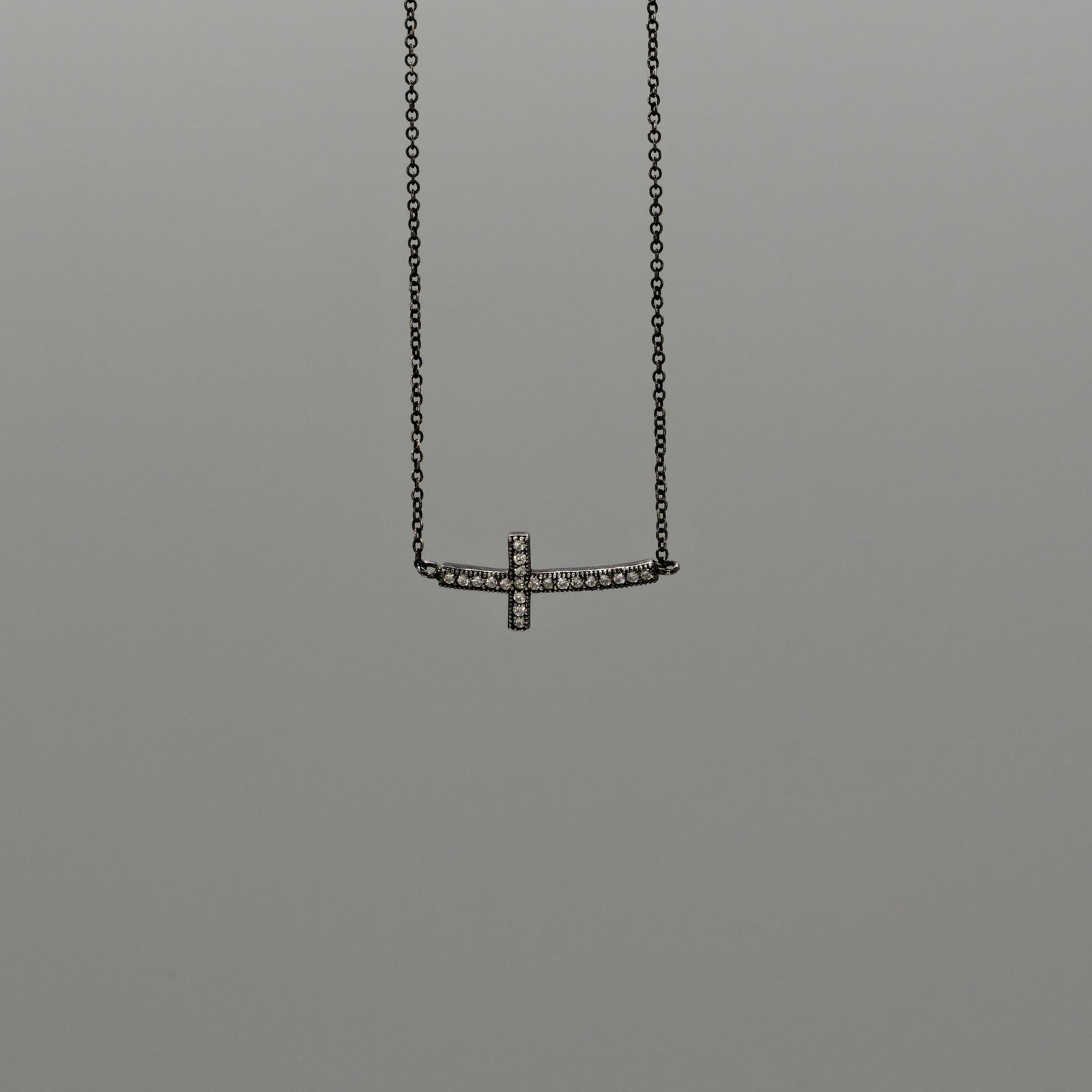 Sideways Spark Cross Necklace