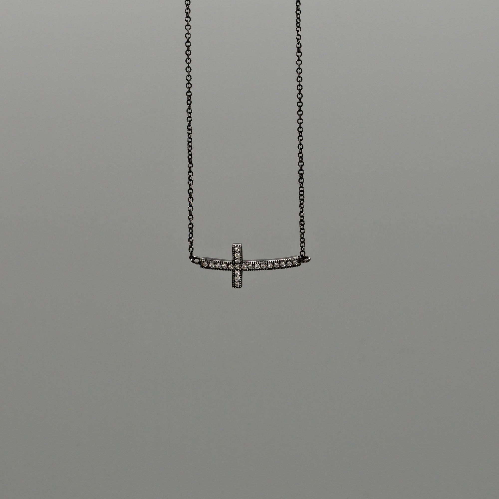 Sideways Spark Cross Necklace