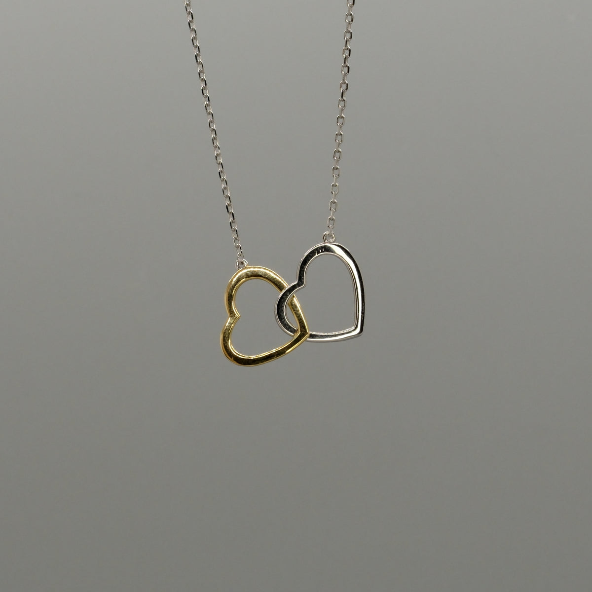 linked hearts necklace