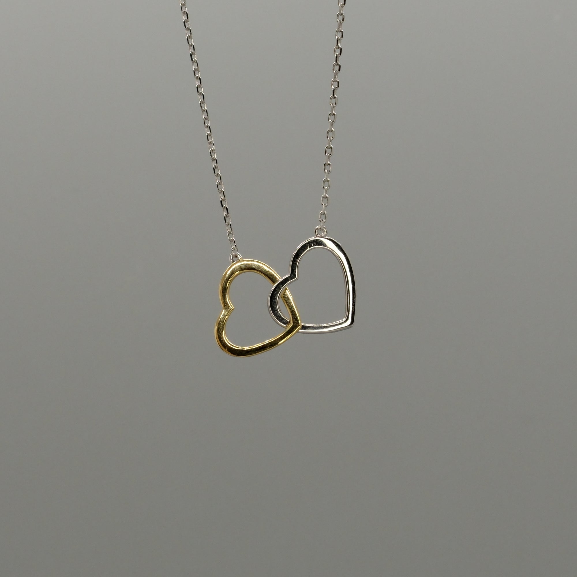 linked hearts necklace