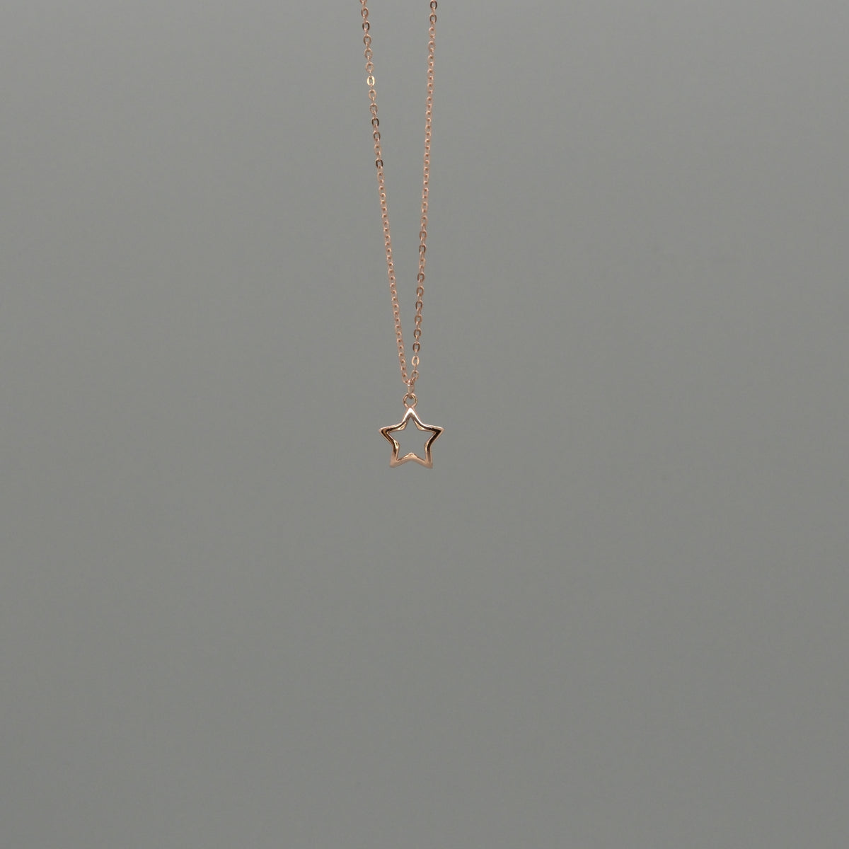 Cut out star necklace