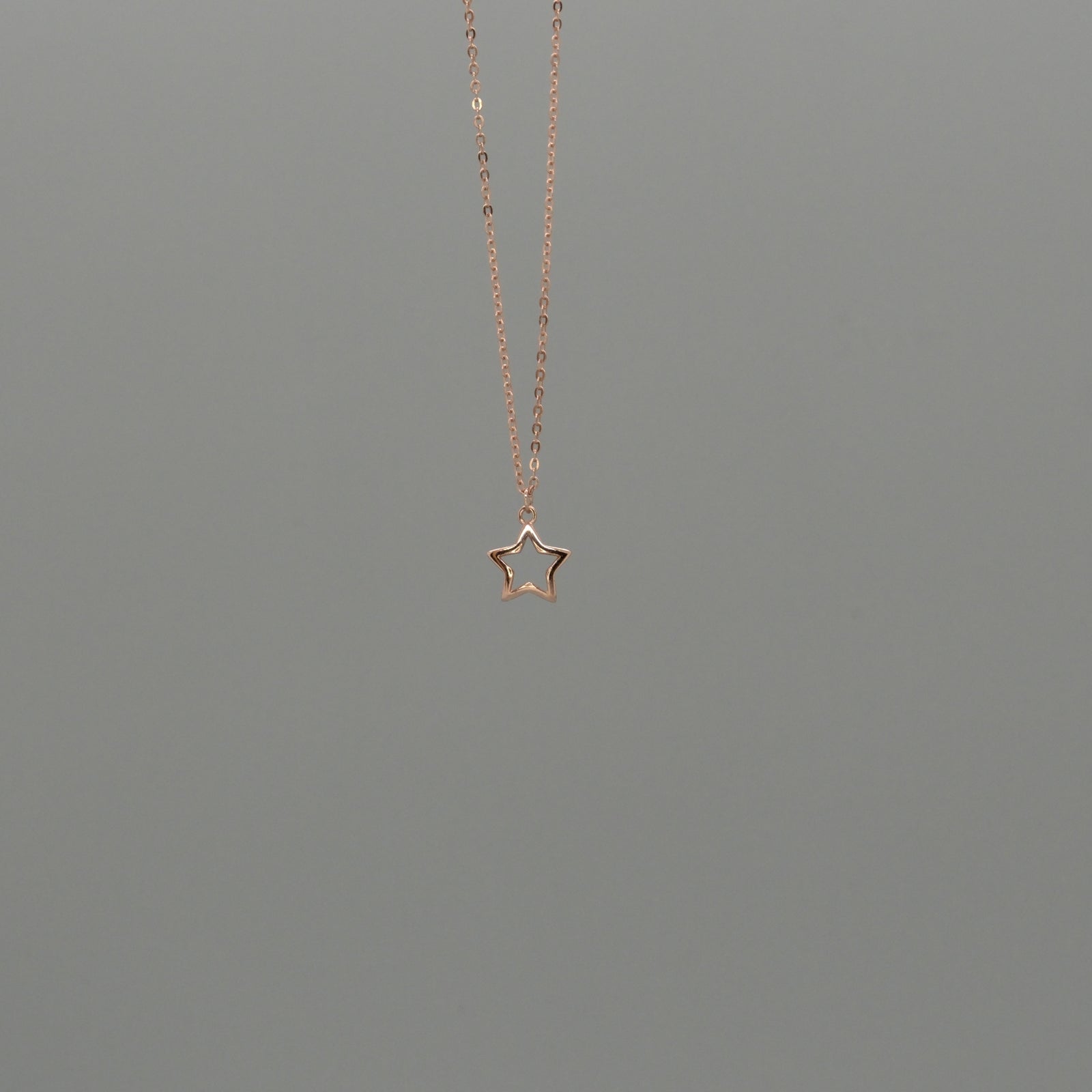 Cut out star necklace