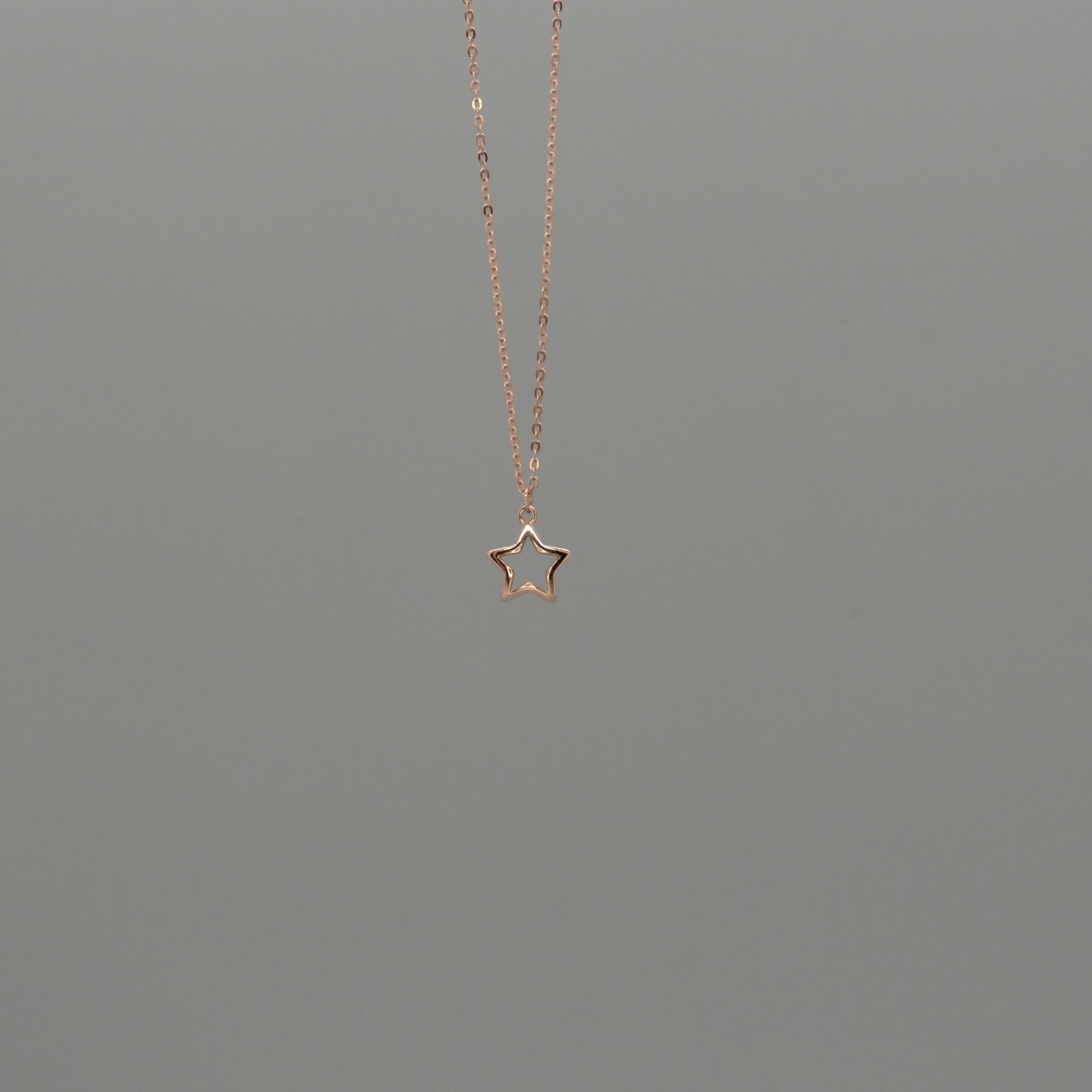 Cut out star necklace