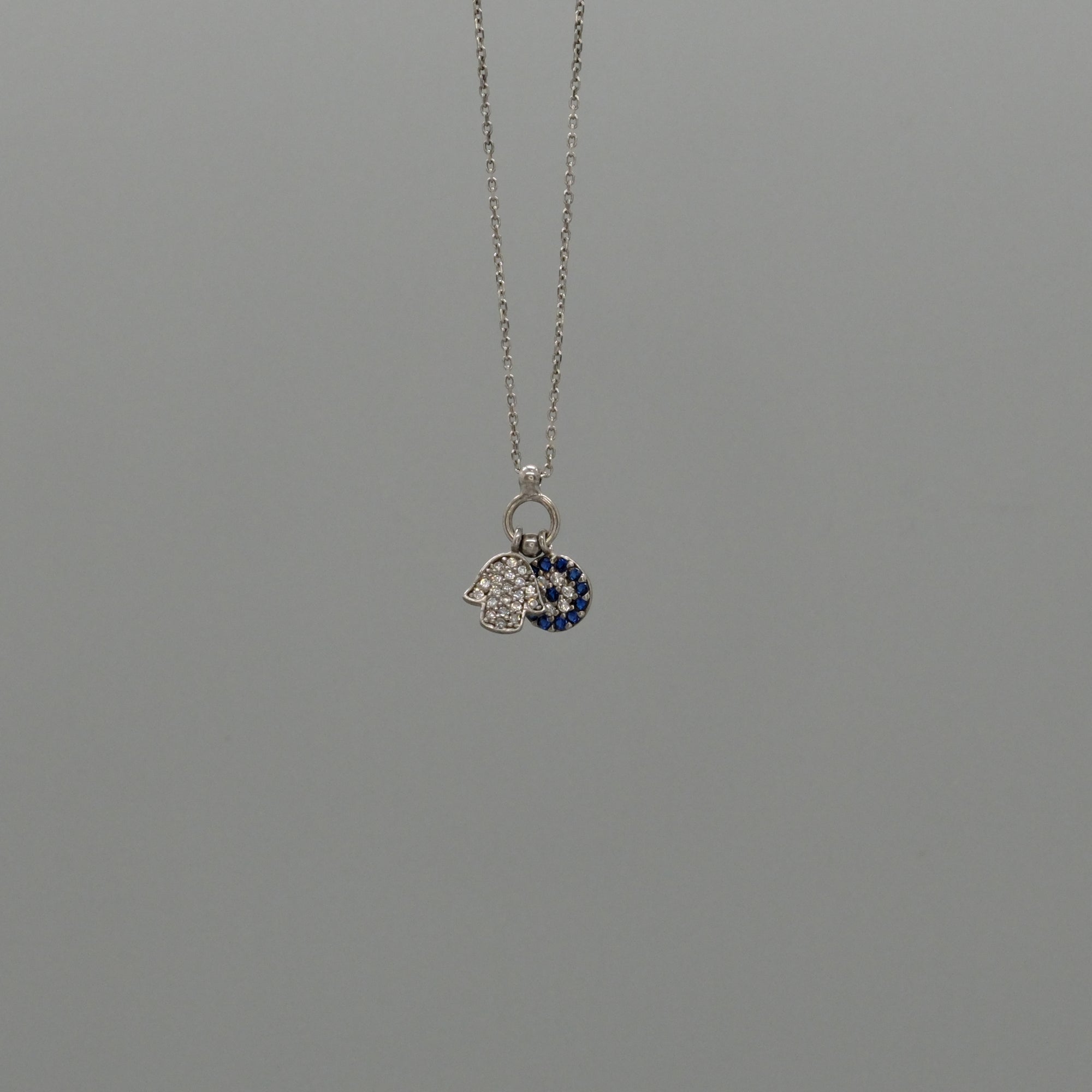 Hamsa and eye necklace