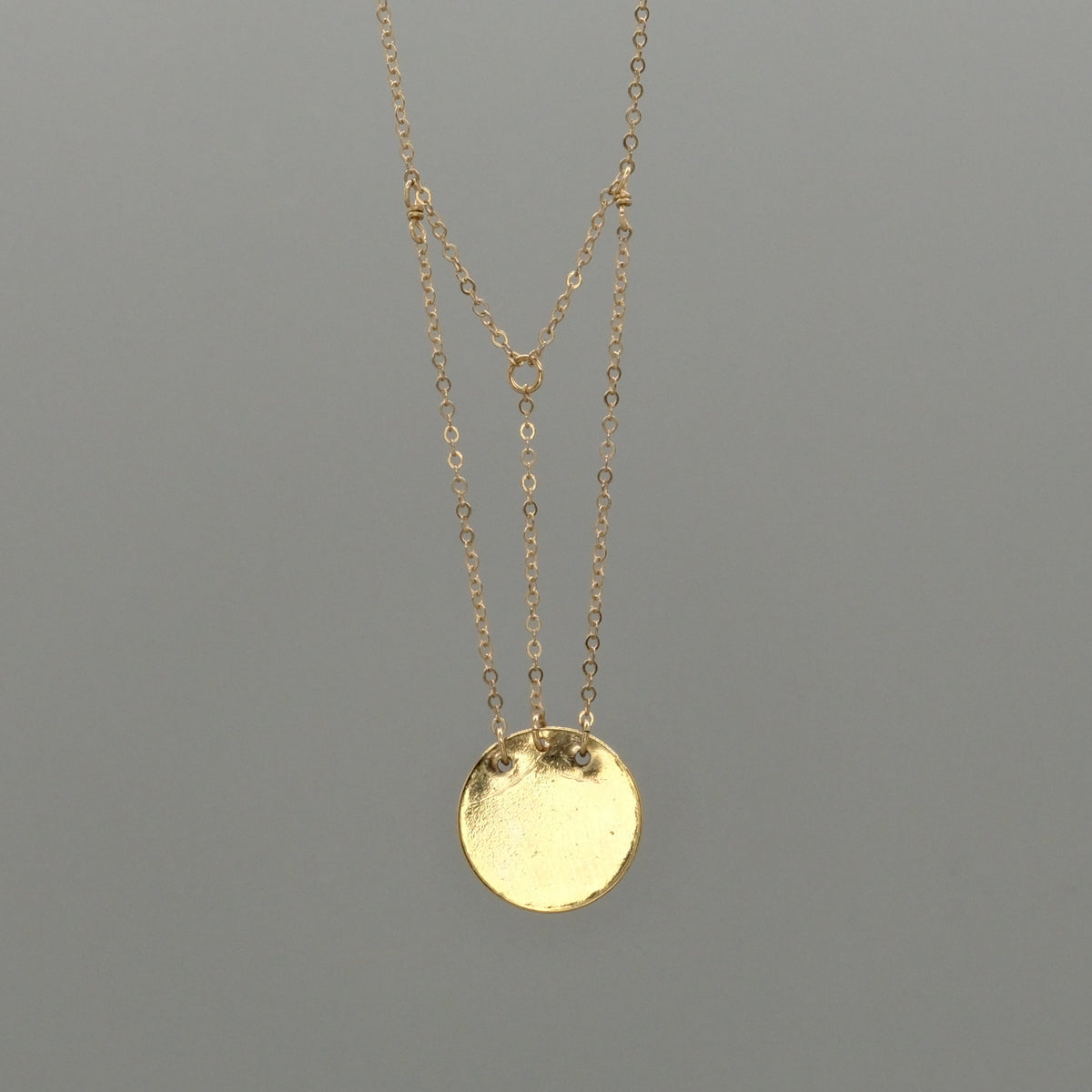 radiant coin necklace