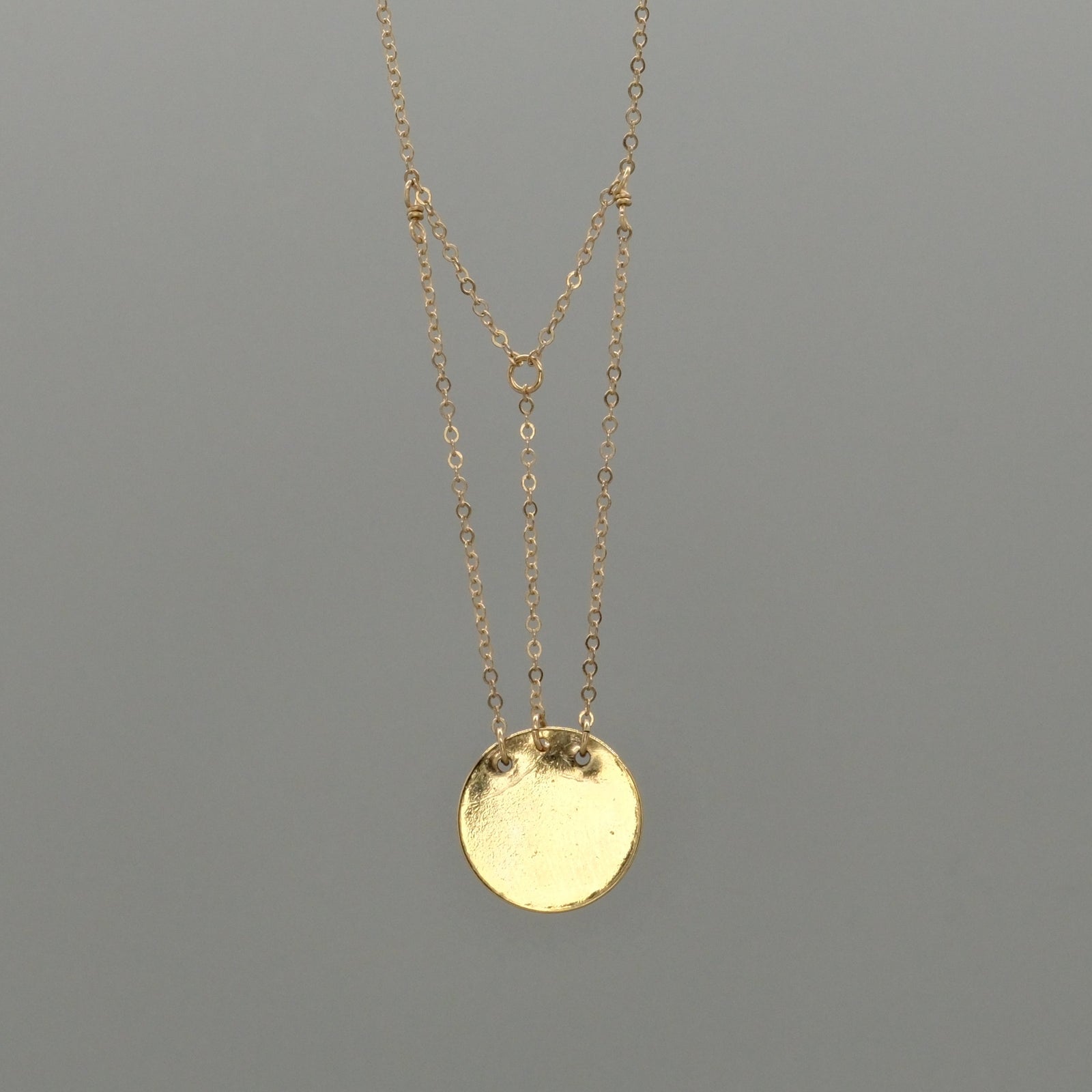 radiant coin necklace