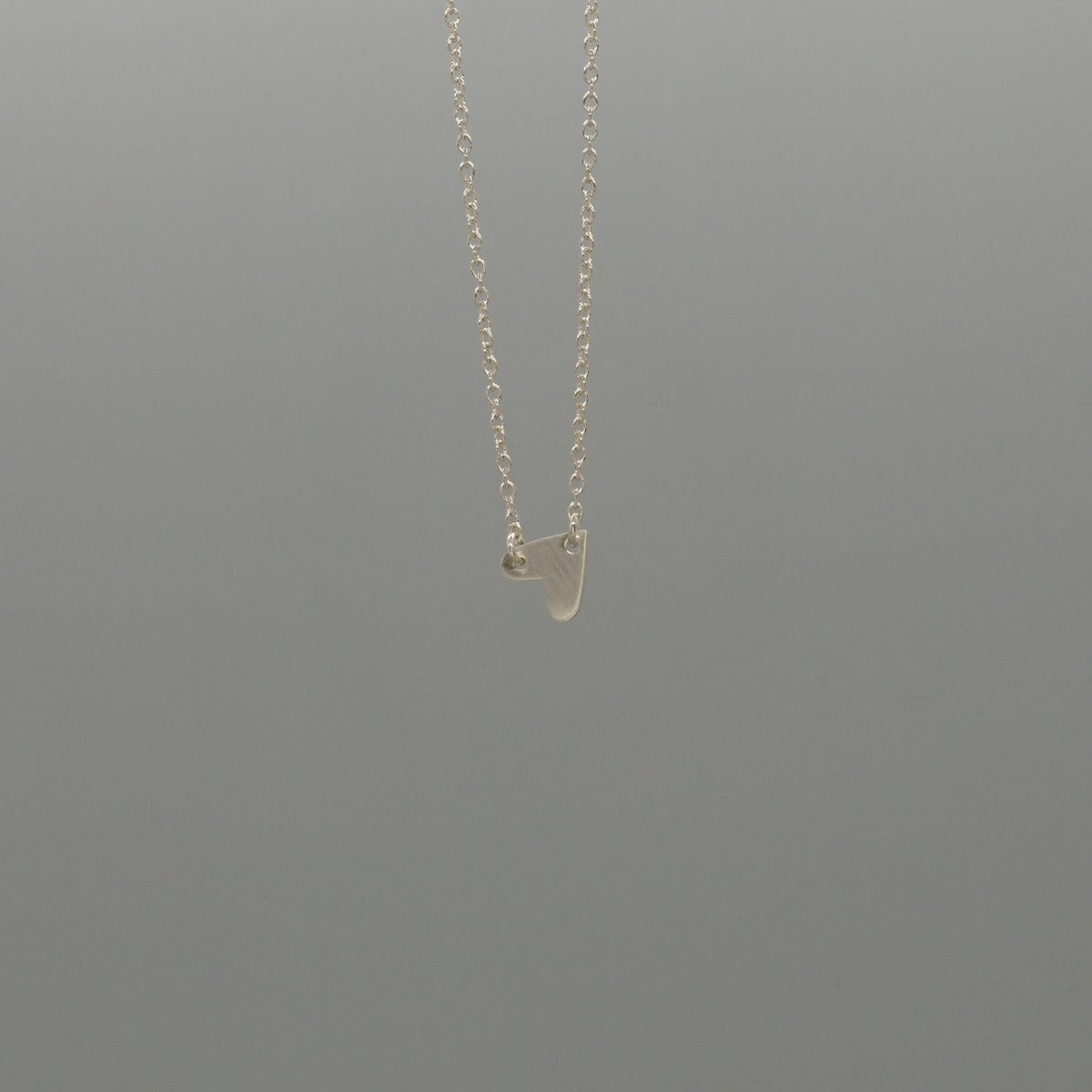 sideway heart necklace