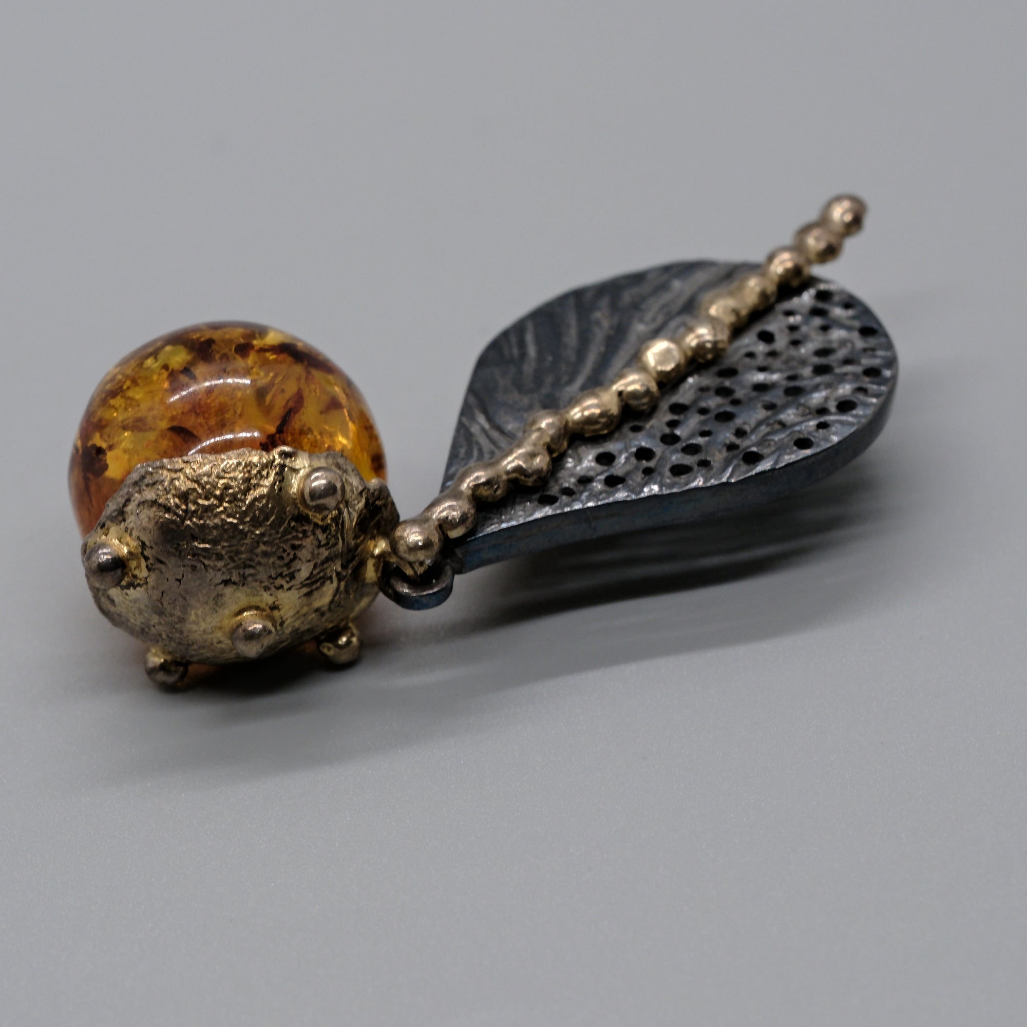 Artisan Amber Orb & Leaf Long Pendant