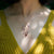 Lina - Iolite and Ruby branch necklace