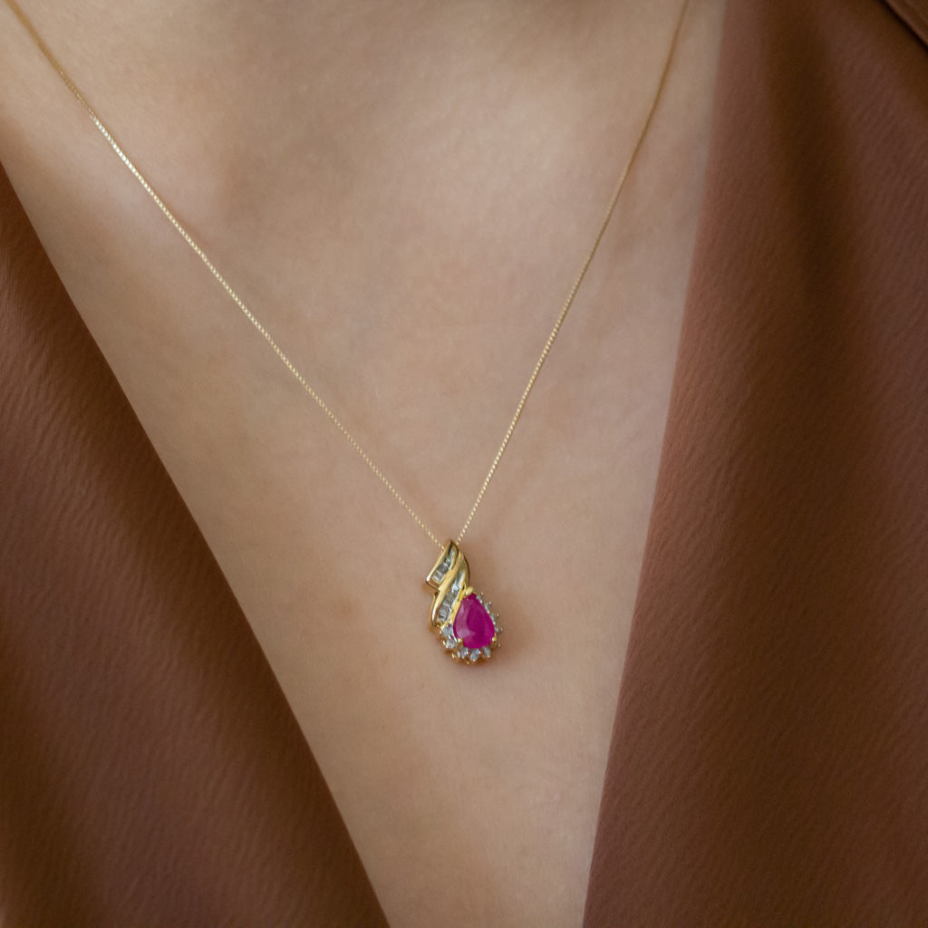 Pear shaped gemstone and diamond necklace