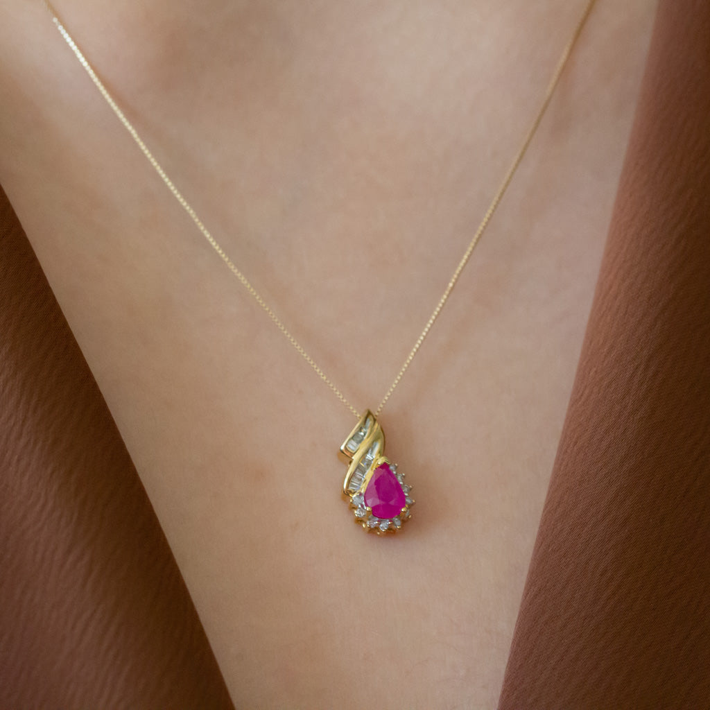 Pear shaped gemstone and diamond necklace