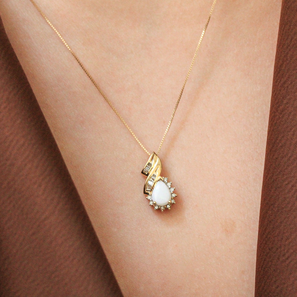 Pear shaped gemstone and diamond necklace