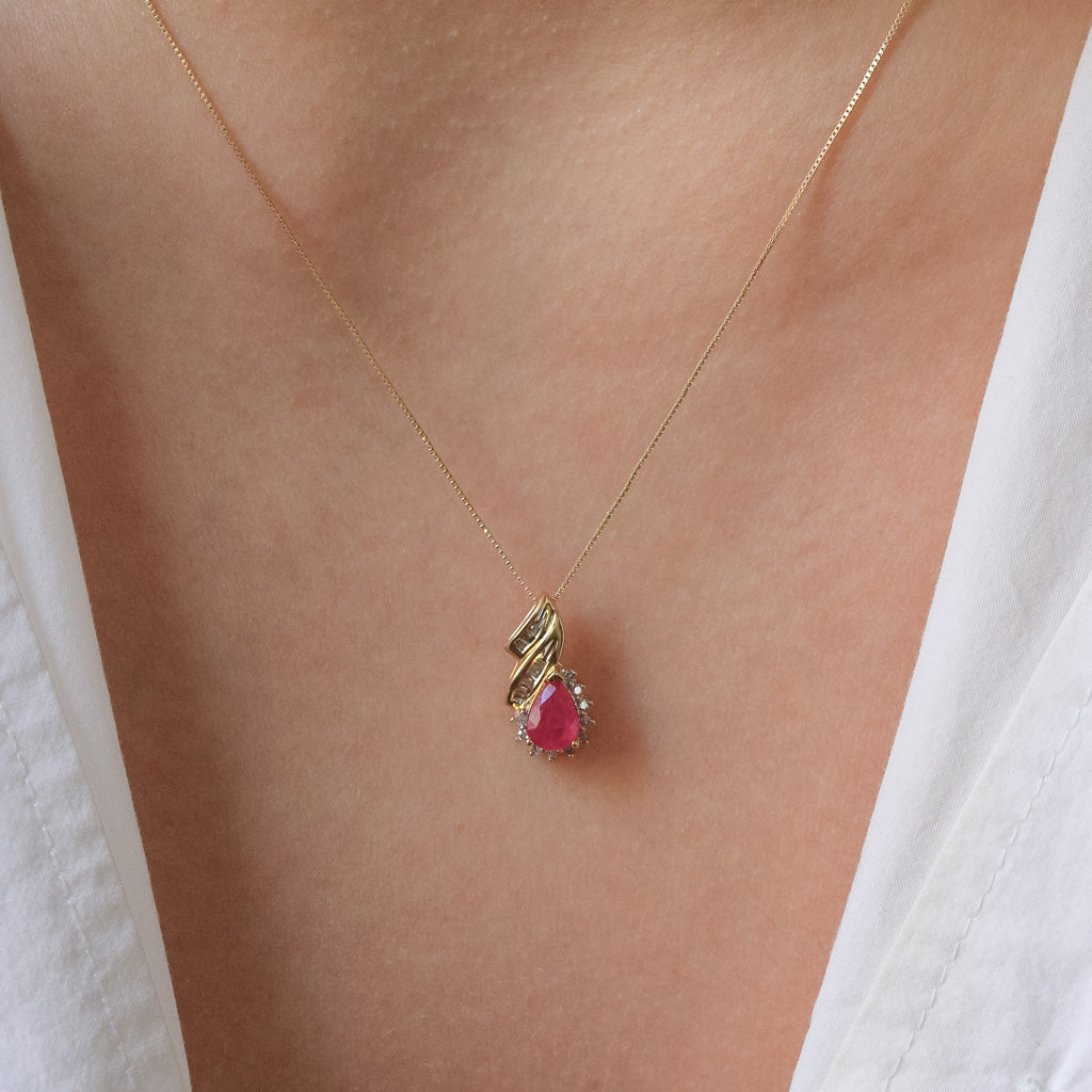Pear shaped gemstone and diamond necklace