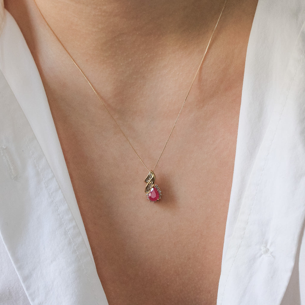 Pear shaped gemstone and diamond necklace
