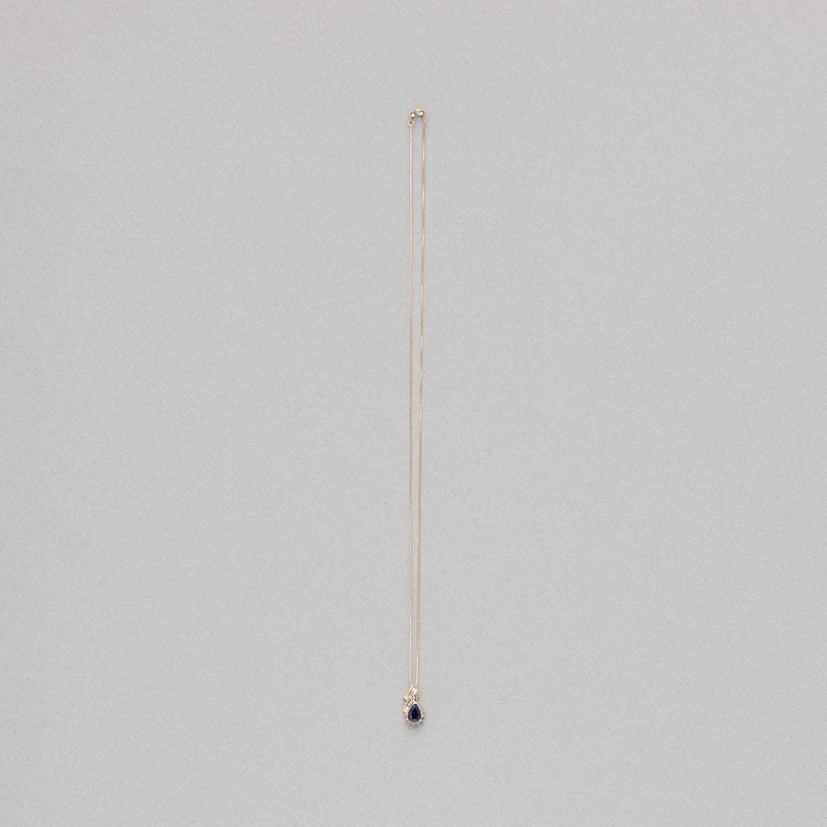 Pear shaped gemstone and diamond necklace