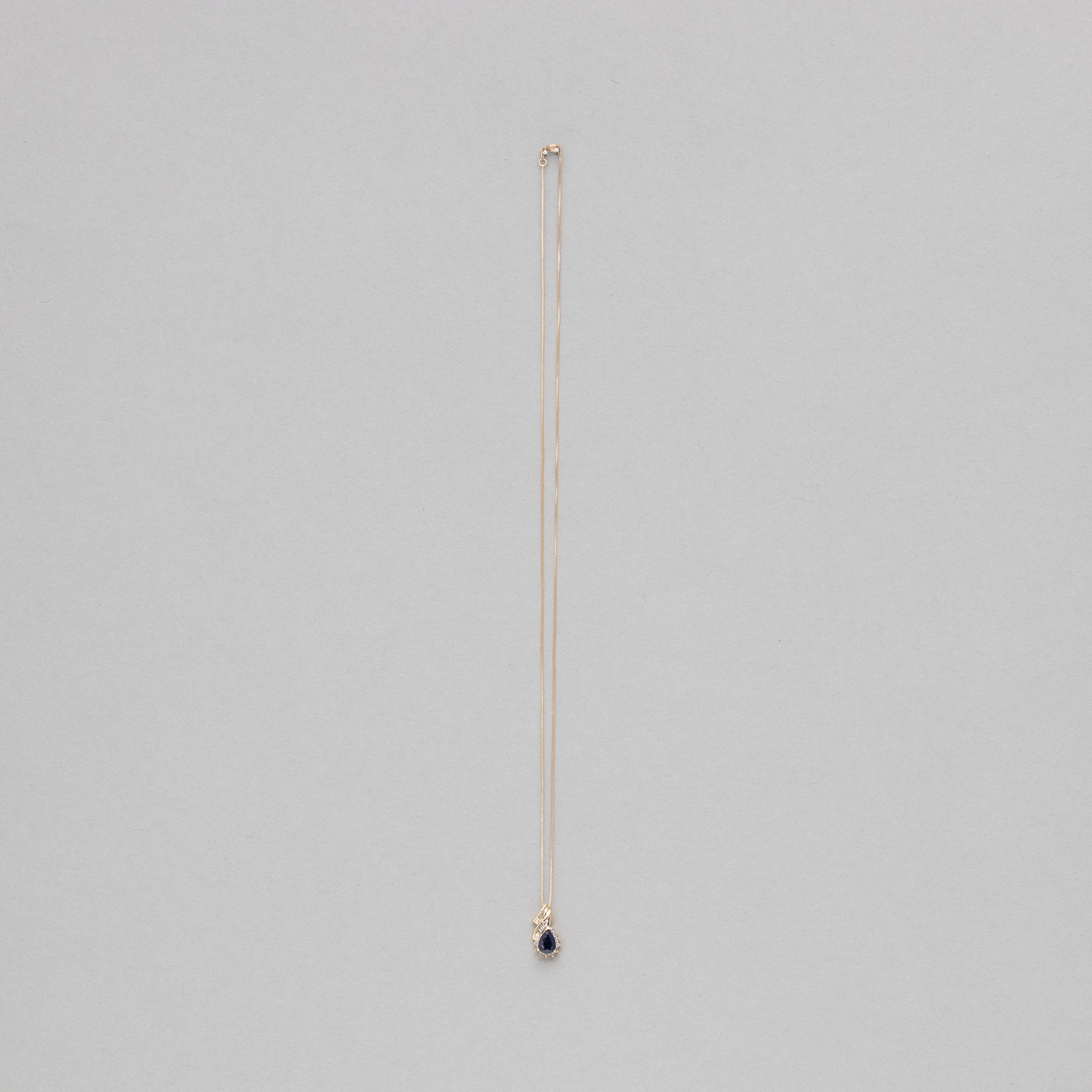 Pear shaped gemstone and diamond necklace