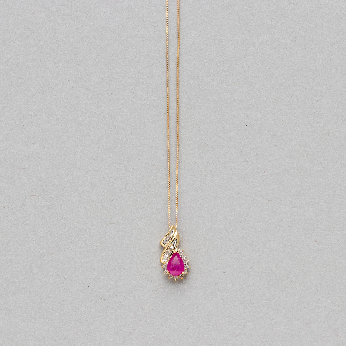 Pear shaped gemstone and diamond necklace