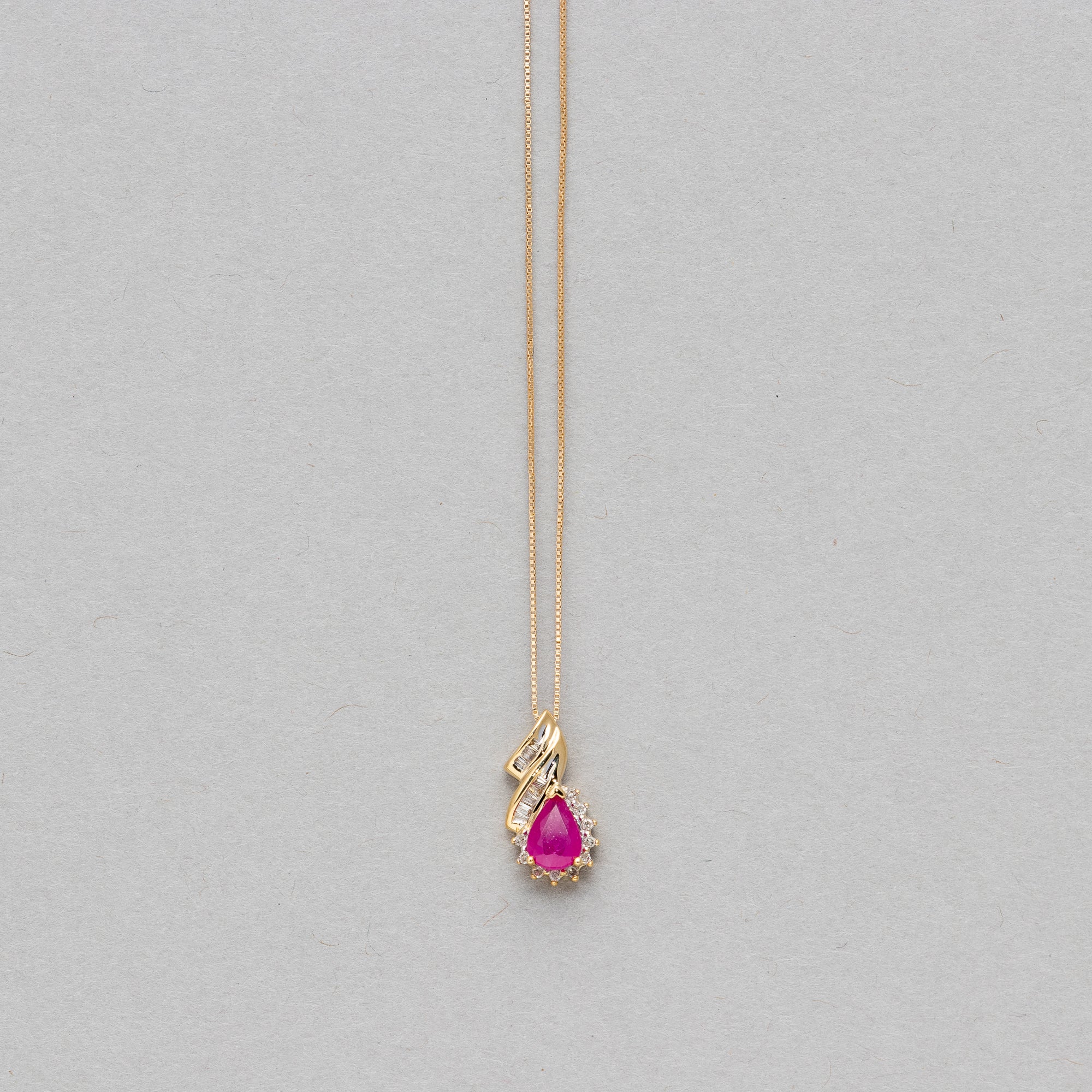 Pear shaped gemstone and diamond necklace