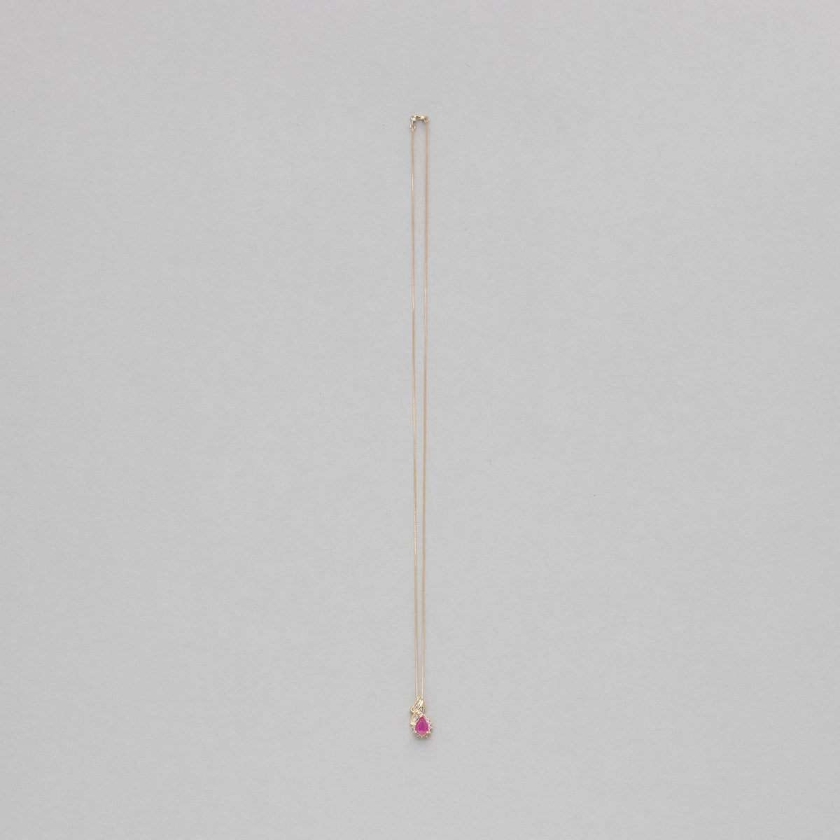 Pear shaped gemstone and diamond necklace