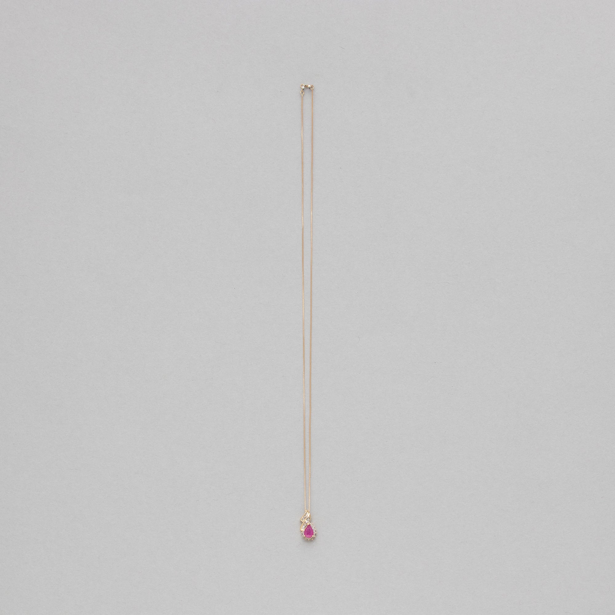 Pear shaped gemstone and diamond necklace