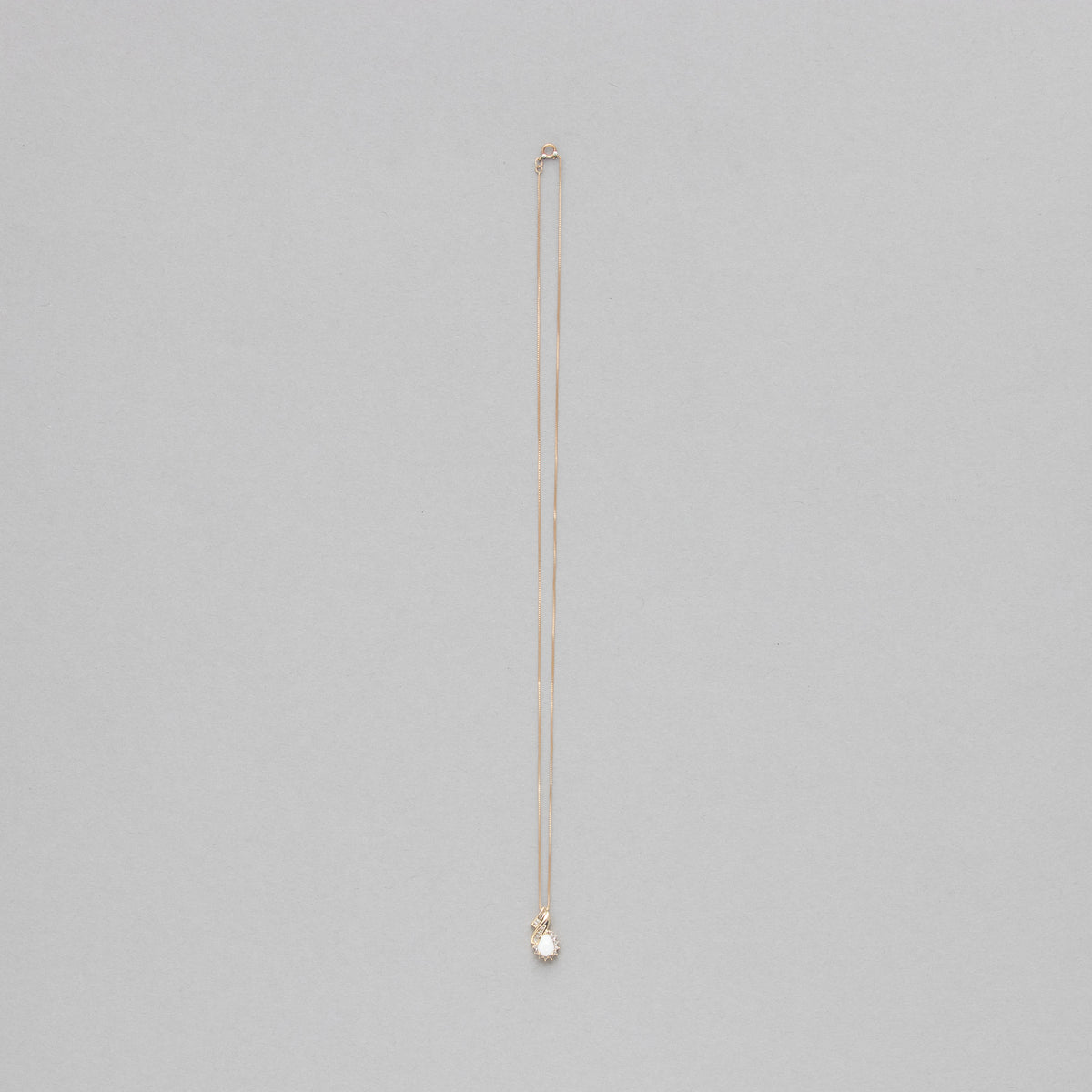 Pear shaped gemstone and diamond necklace