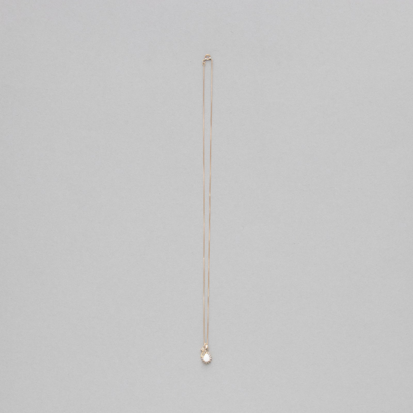 Pear shaped gemstone and diamond necklace