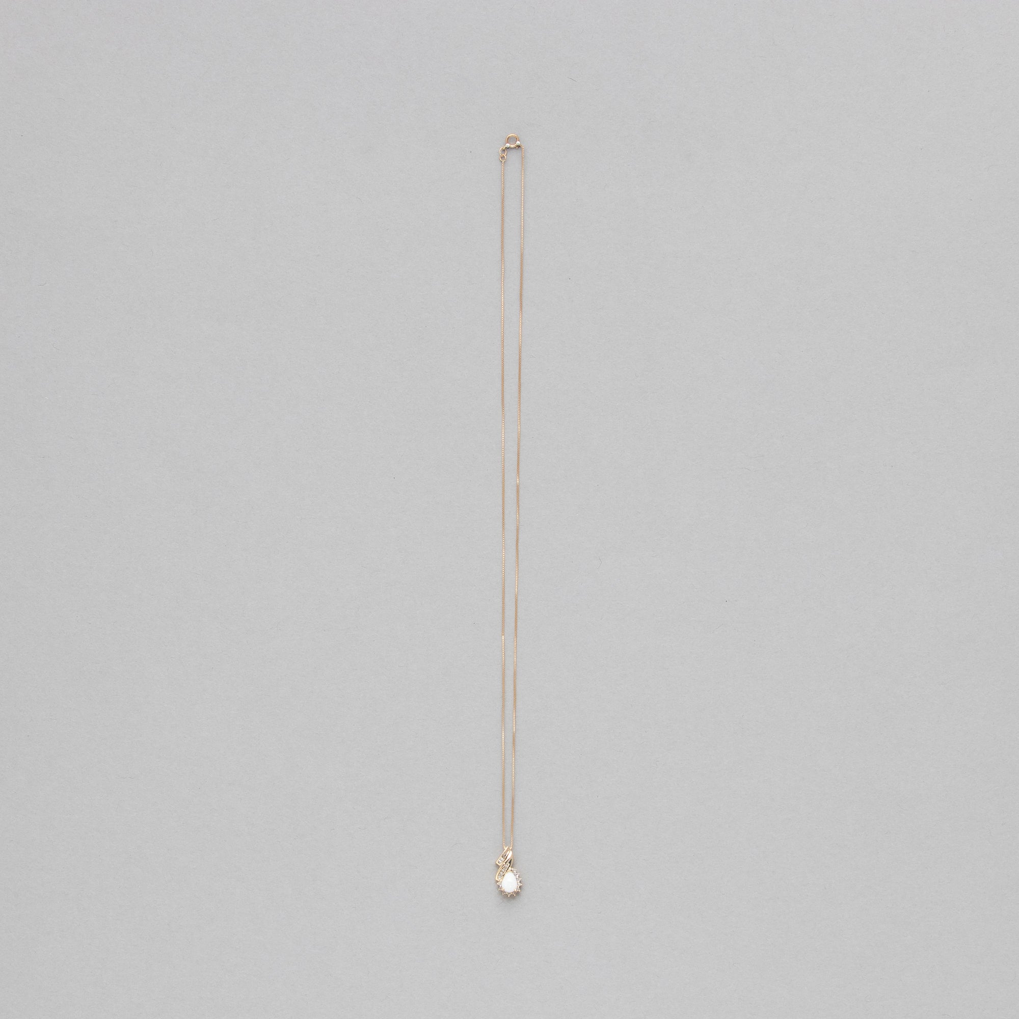 Pear shaped gemstone and diamond necklace