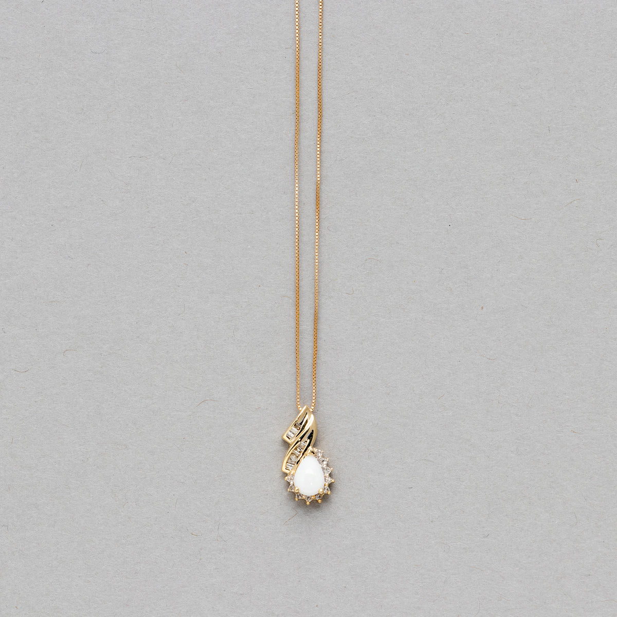 Pear shaped gemstone and diamond necklace