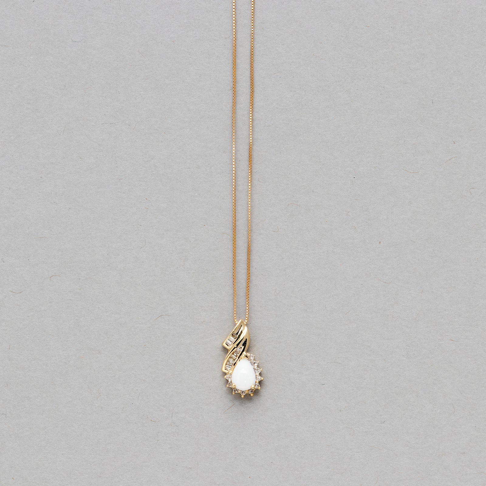 Pear shaped gemstone and diamond necklace