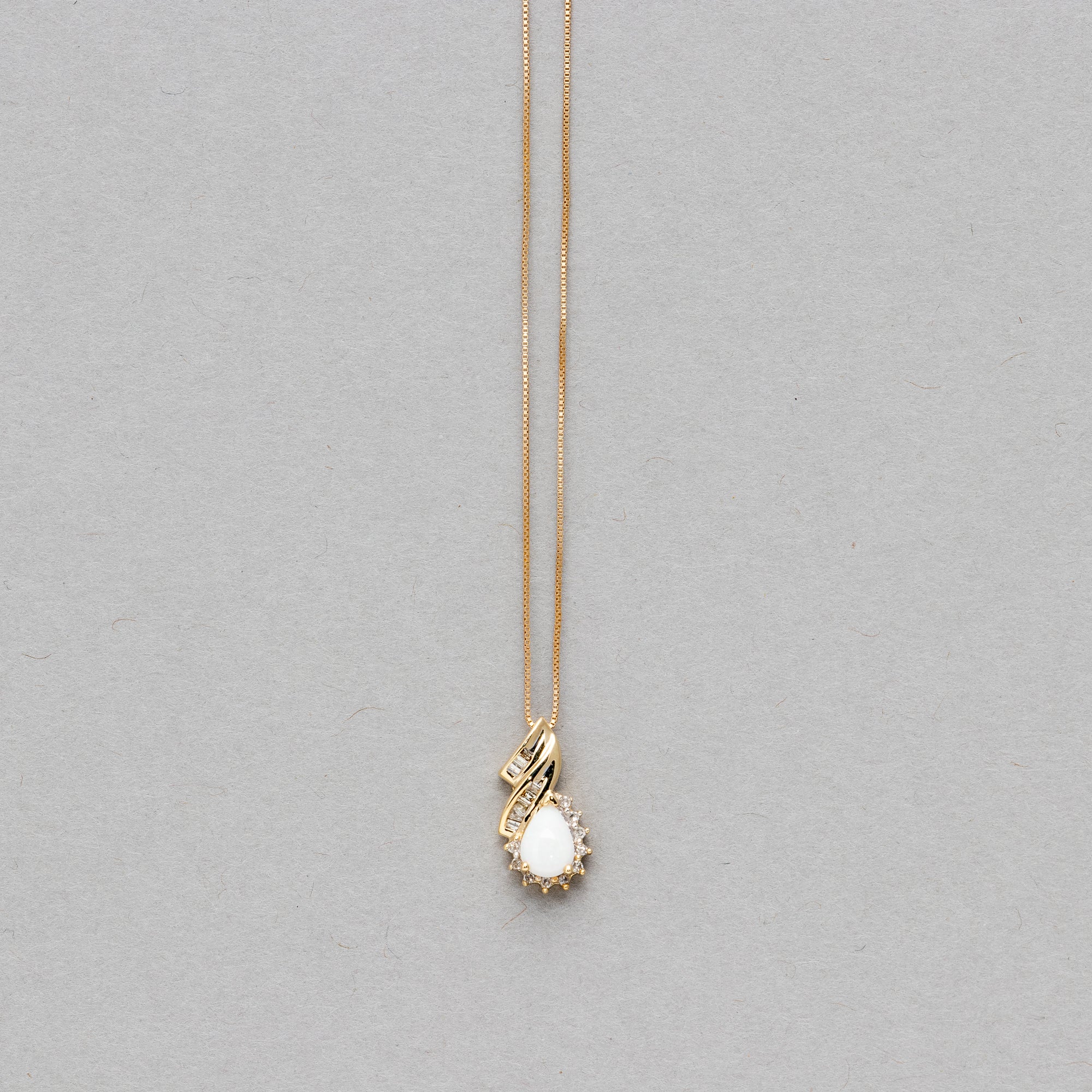 Pear shaped gemstone and diamond necklace