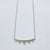 NSC - Curved bar triangle drop necklace